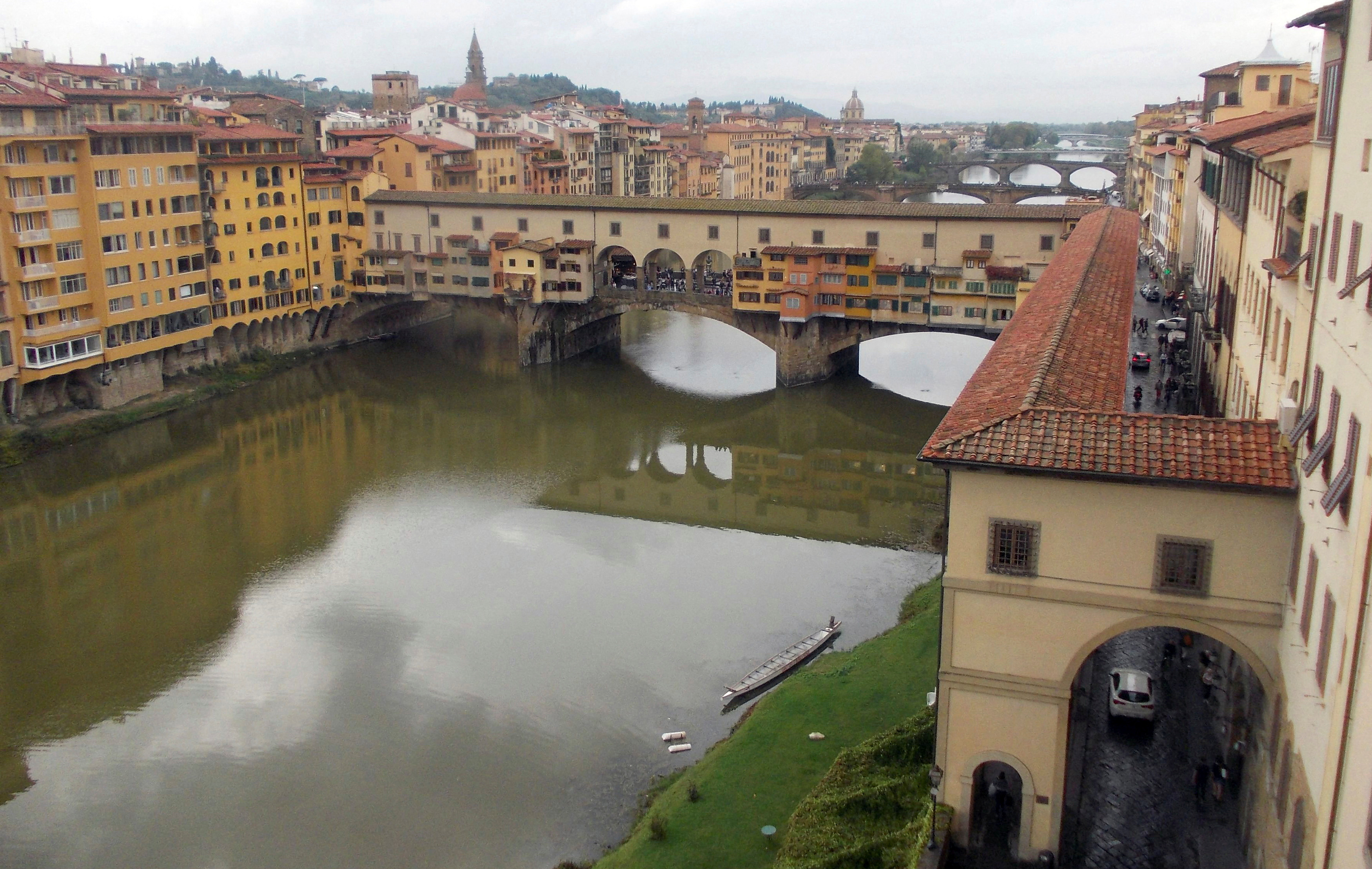 A view shows the Ponte Vecchio bridge and the Arno River in Florence