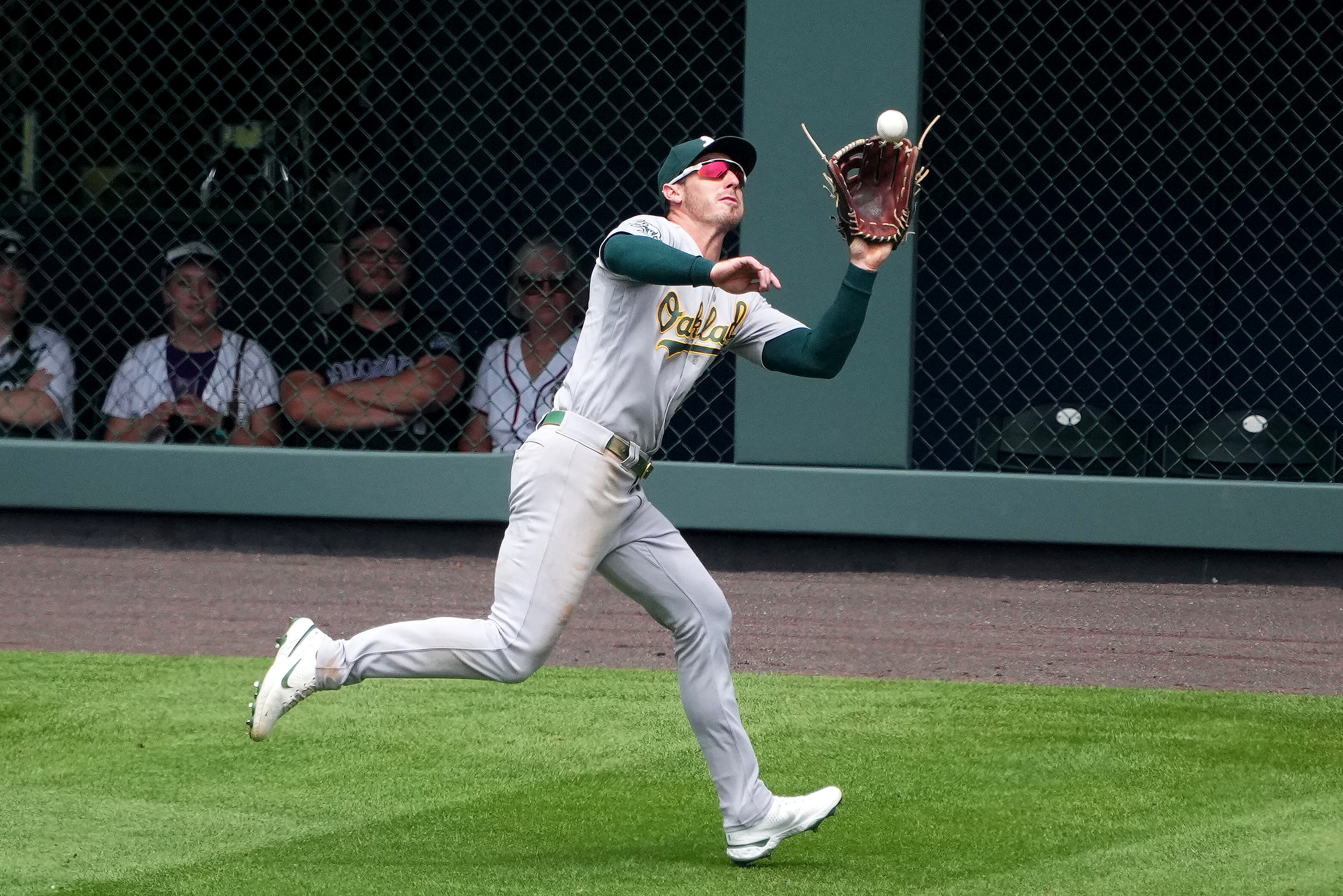 Ryan McMahon drives in both runs as Rockies knock off A's