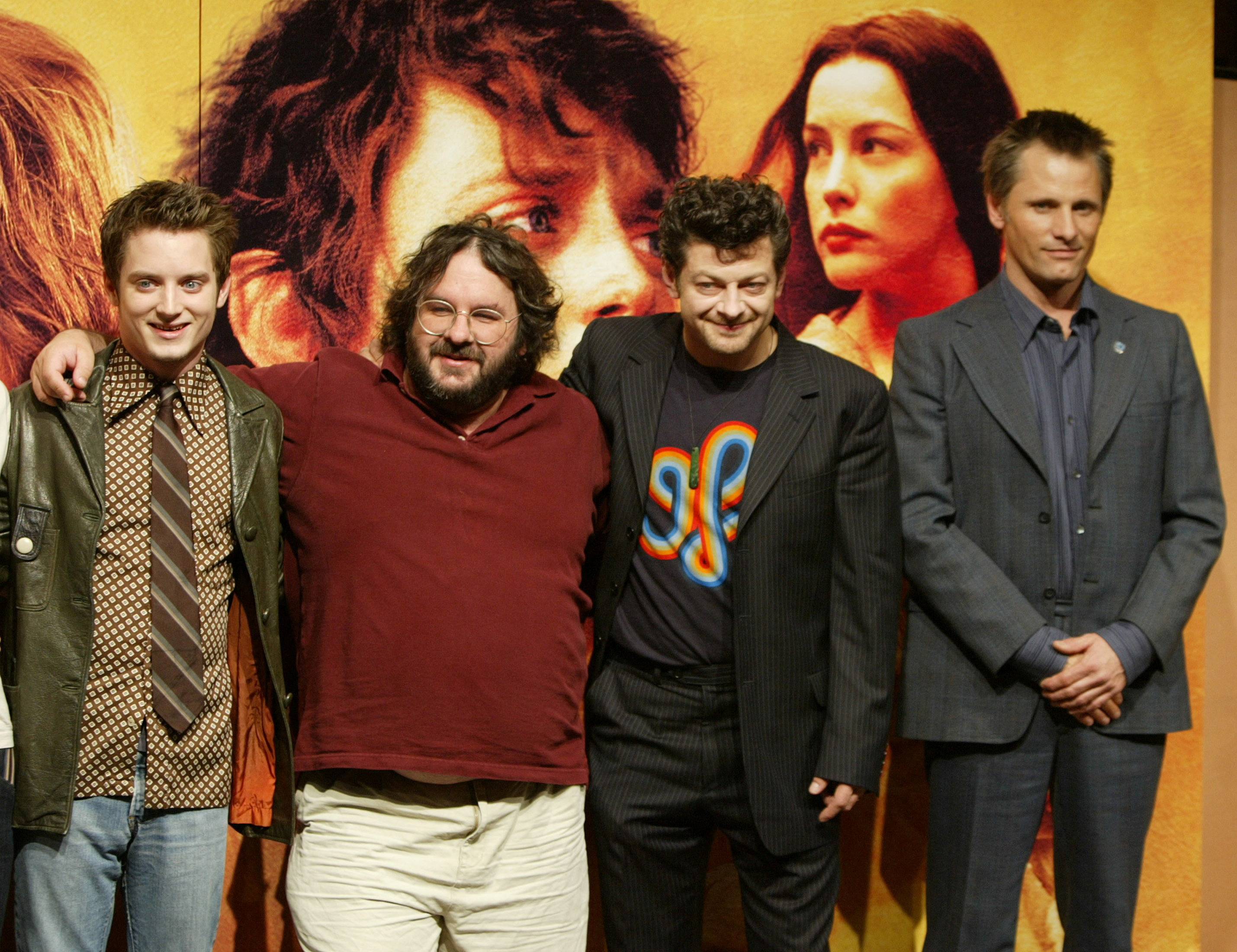 CAST MEMBERS AND DIRECTOR OF 'LORD OF THE RINGS - THE RETURN OF THE KING' POSE IN TOKYO.