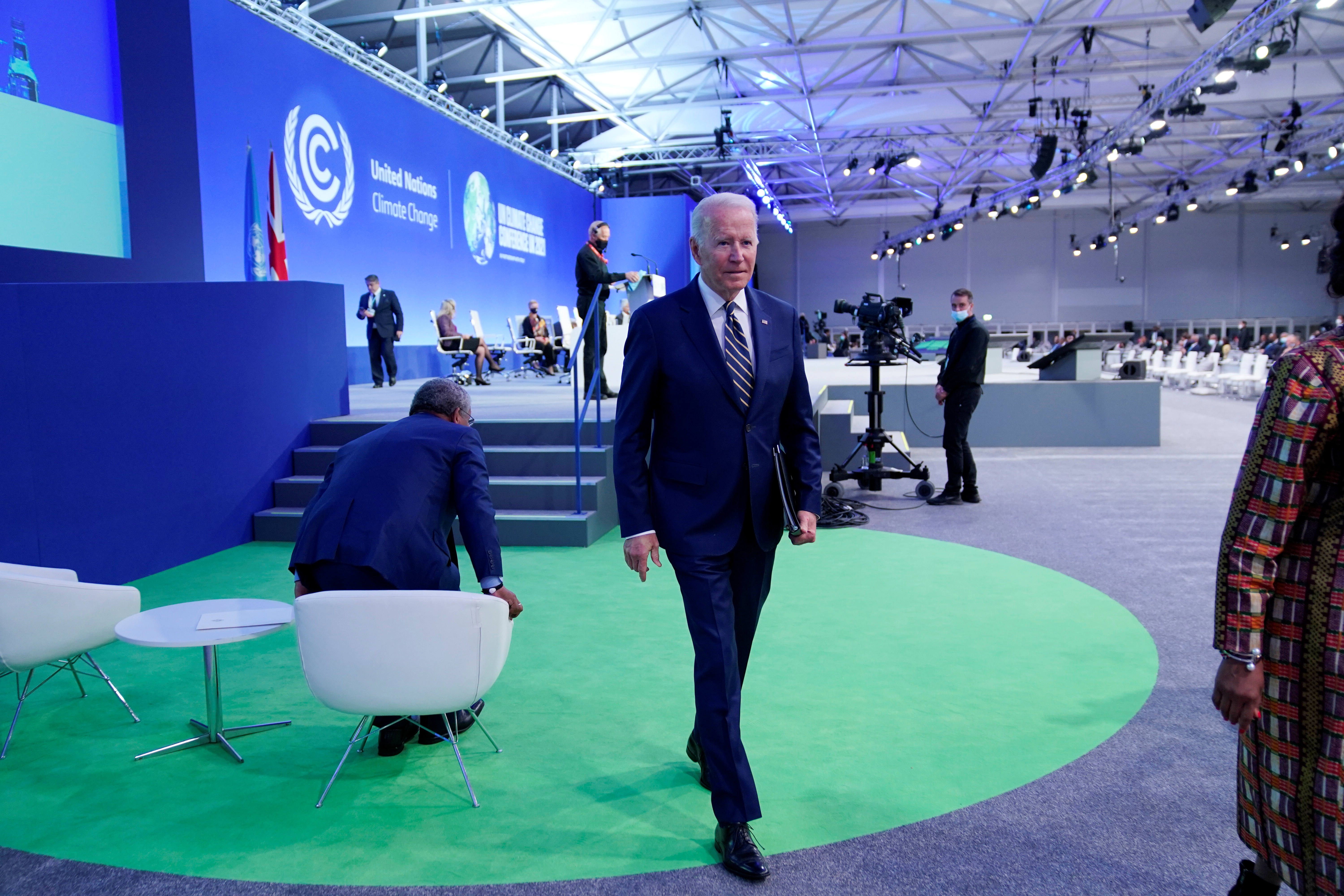 U.S. President Joe Biden walks off after speaking during the UN Climate Change Conference (COP26) in Glasgow, Scotland, Britain November 1, 2021. Evan Vucci/ Pool via REUTERS