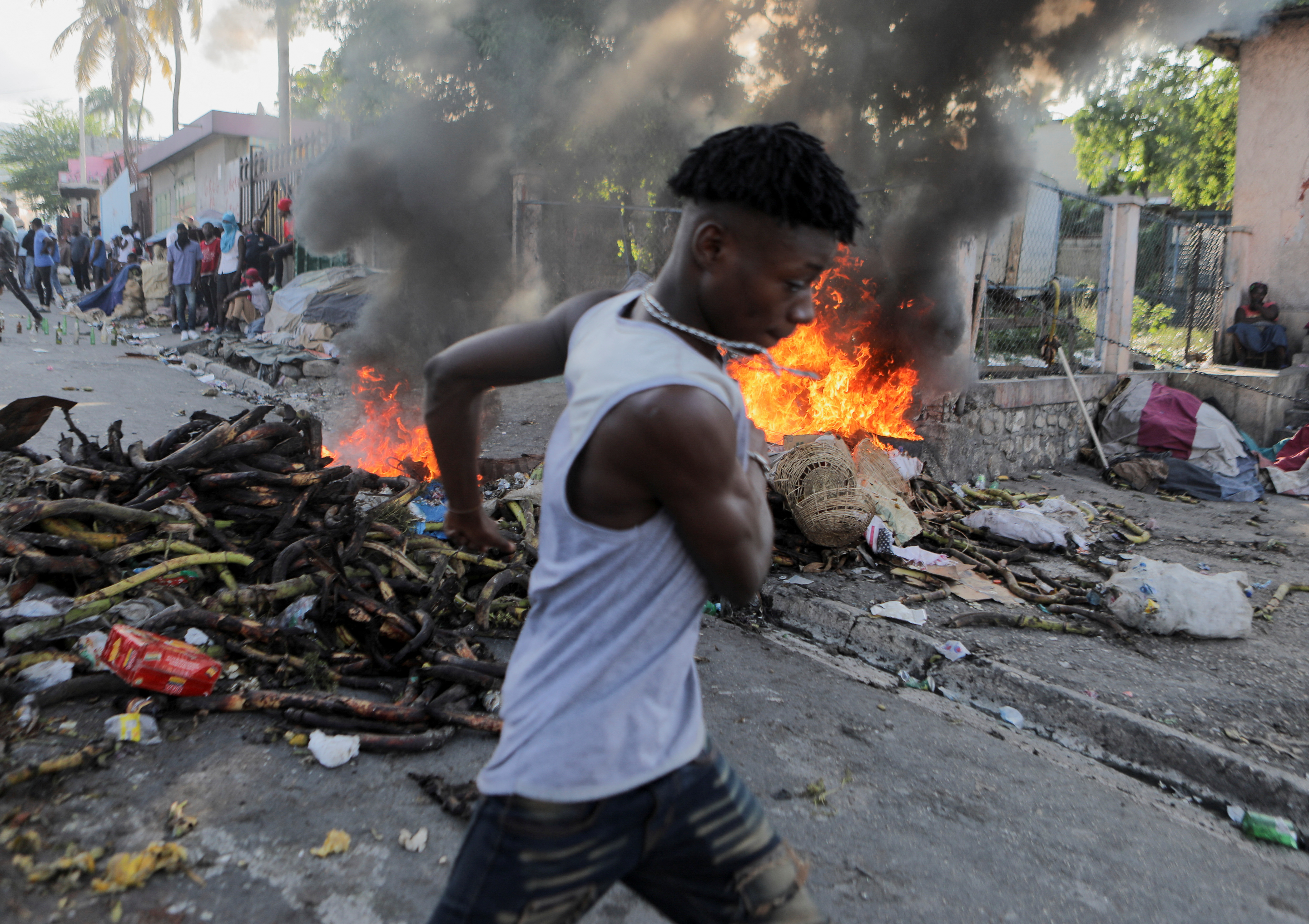 Haitians protest against the government and rising fuel prices, in Port-au-Prince