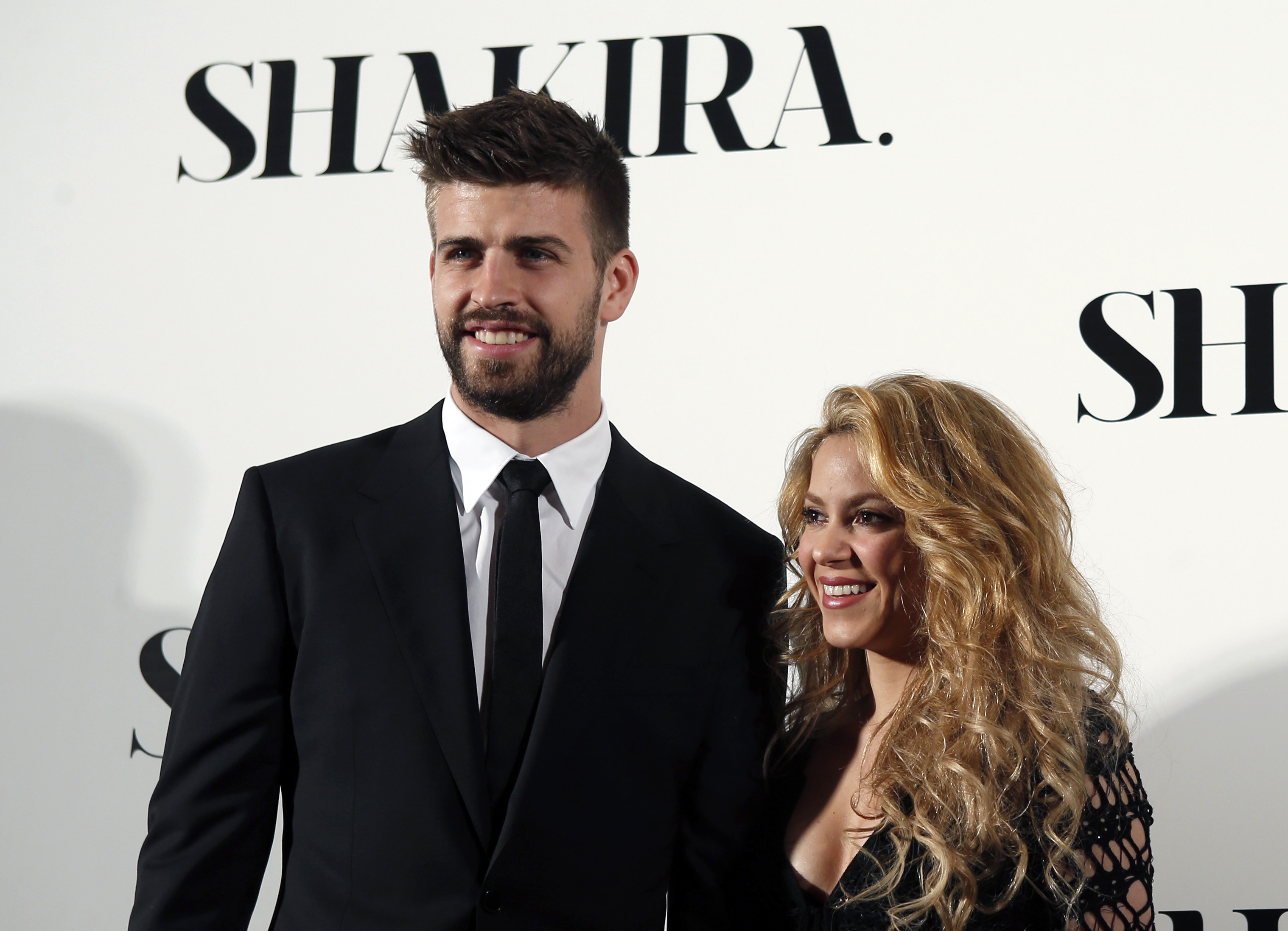 Colombian singer Shakira and FC Barcelona's soccer player Gerard Pique pose during a photocall presenting her new album "Shakira" in Barcelona