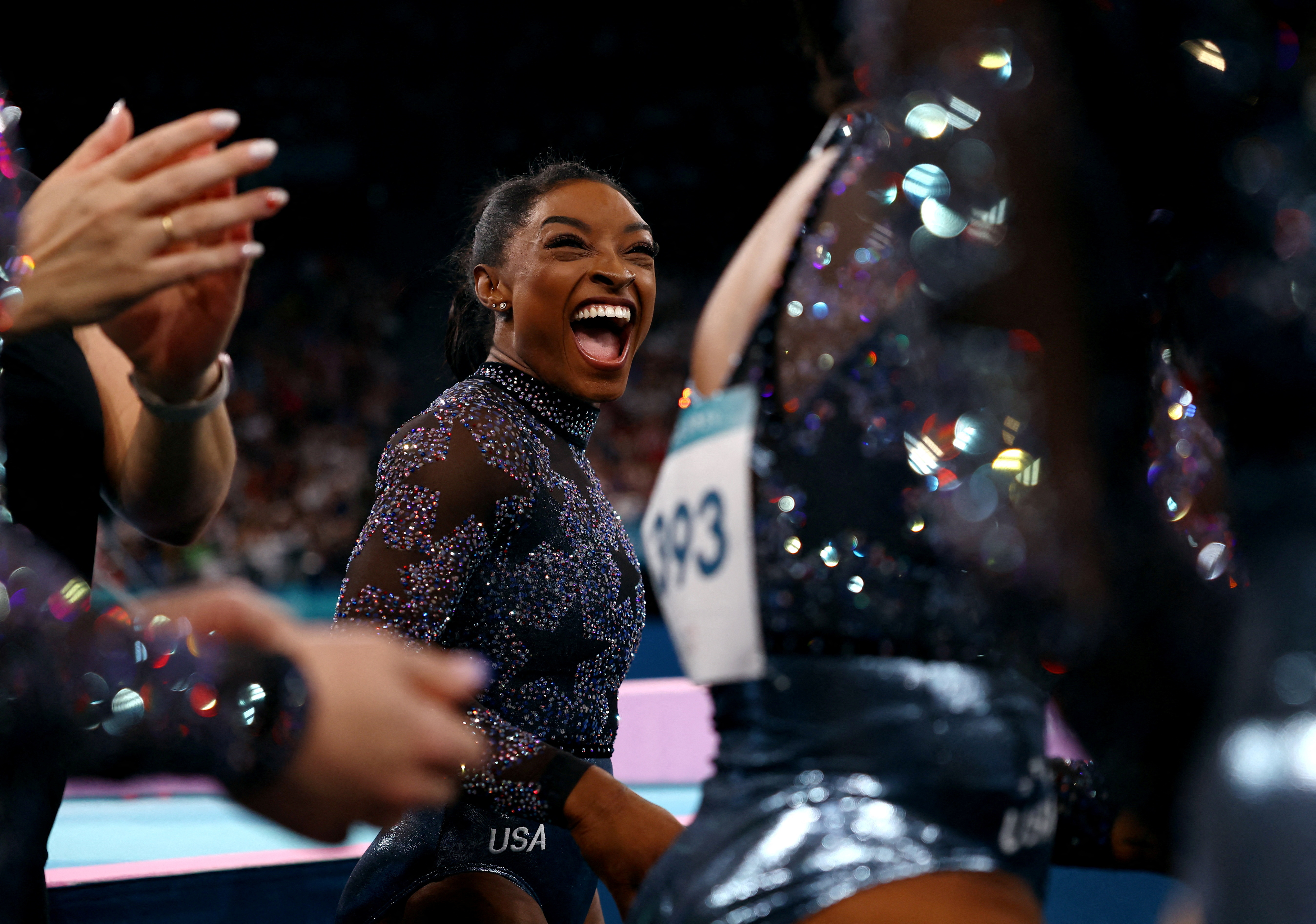 Olympics-Gymnastics-Simone Biles fights through calf pain in Paris Olympic  debut | Reuters