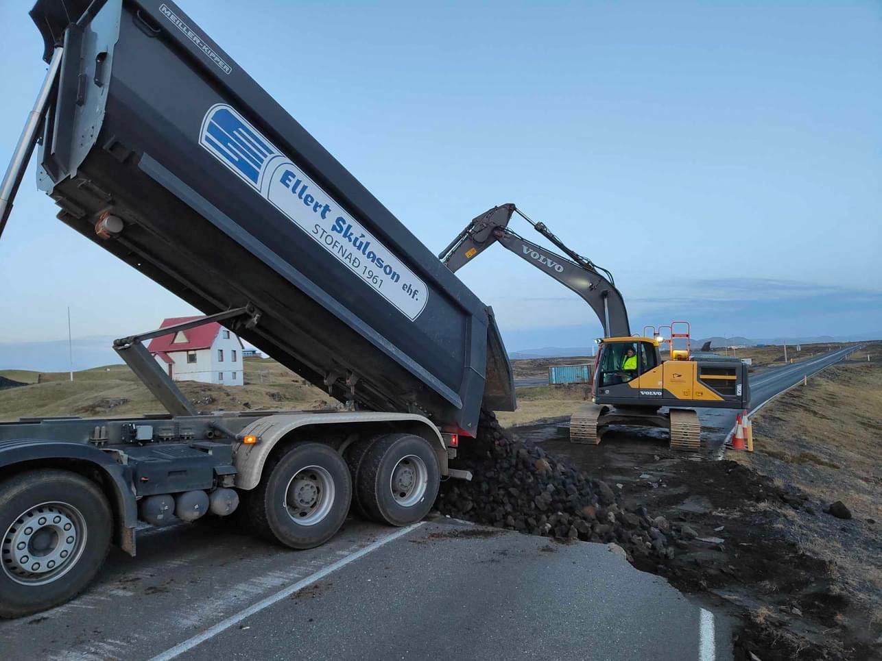 Streetwork is going on after cracks emerged on a road due to volcanic activity near Grindavik