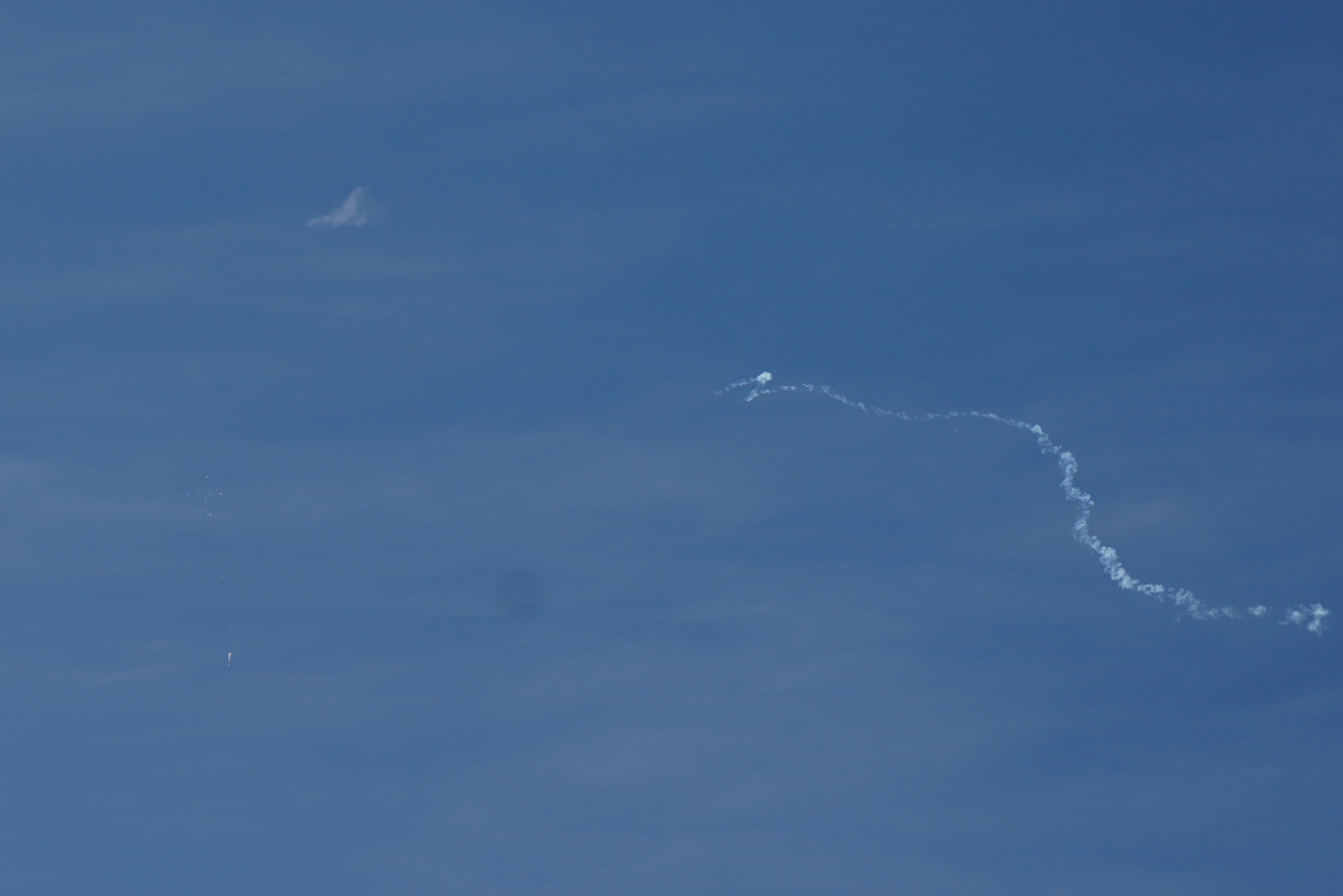 A view of what is believed to be a suspected Chinese spy balloon when it was shot down, seen from Holden Beach