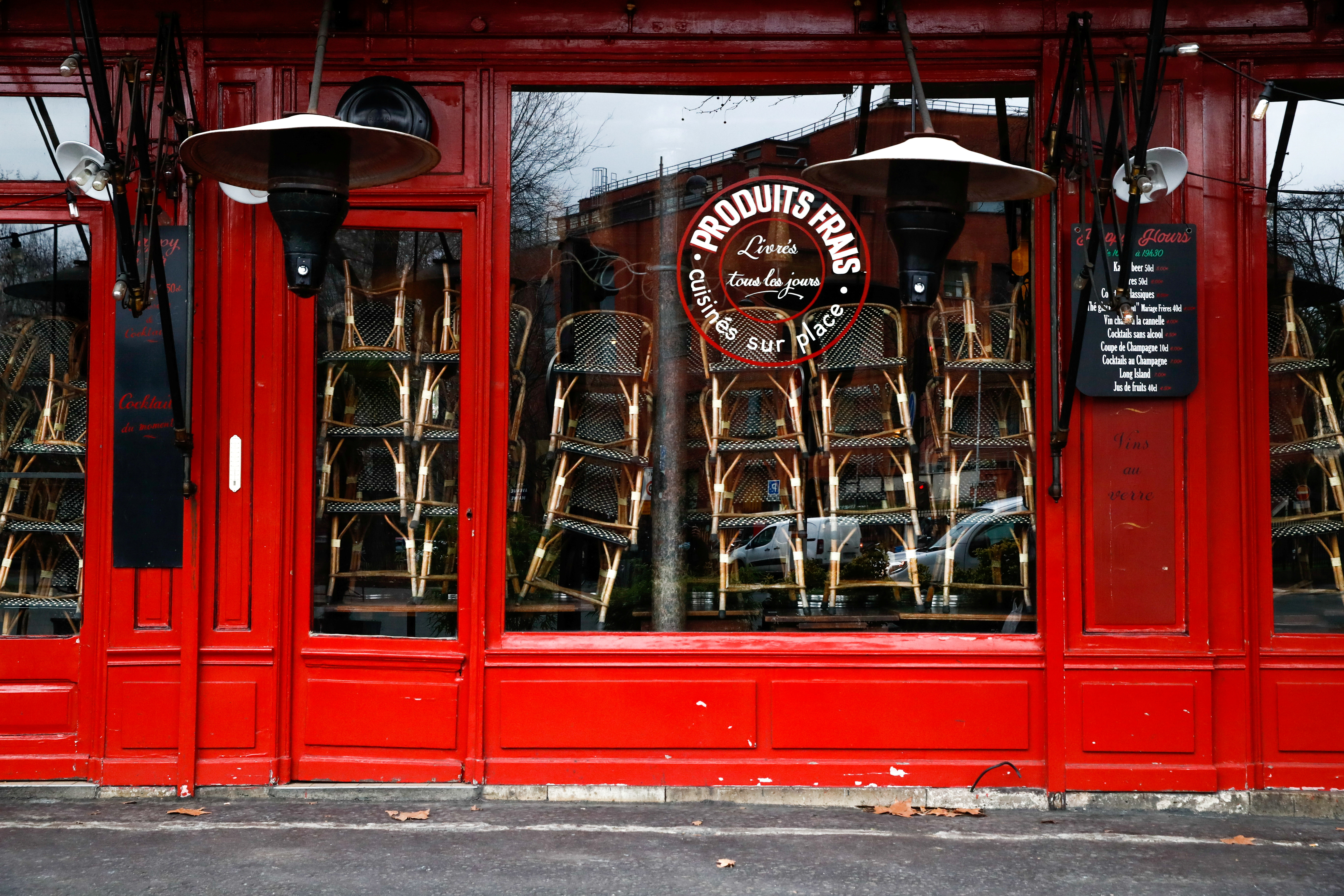 A view shows chairs stacked inside a closed restaurant in Paris as the French government keeps bars and restaurants closed as part of COVID-19 restrictions measures to fight the coronavirus disease outbreak in France, January 5, 2021. REUTERS/Gonzalo Fuentes