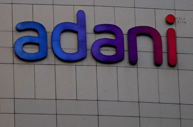 The logo of the Adani Group is seen on the facade of its Corporate House on the outskirts of Ahmedabad, India