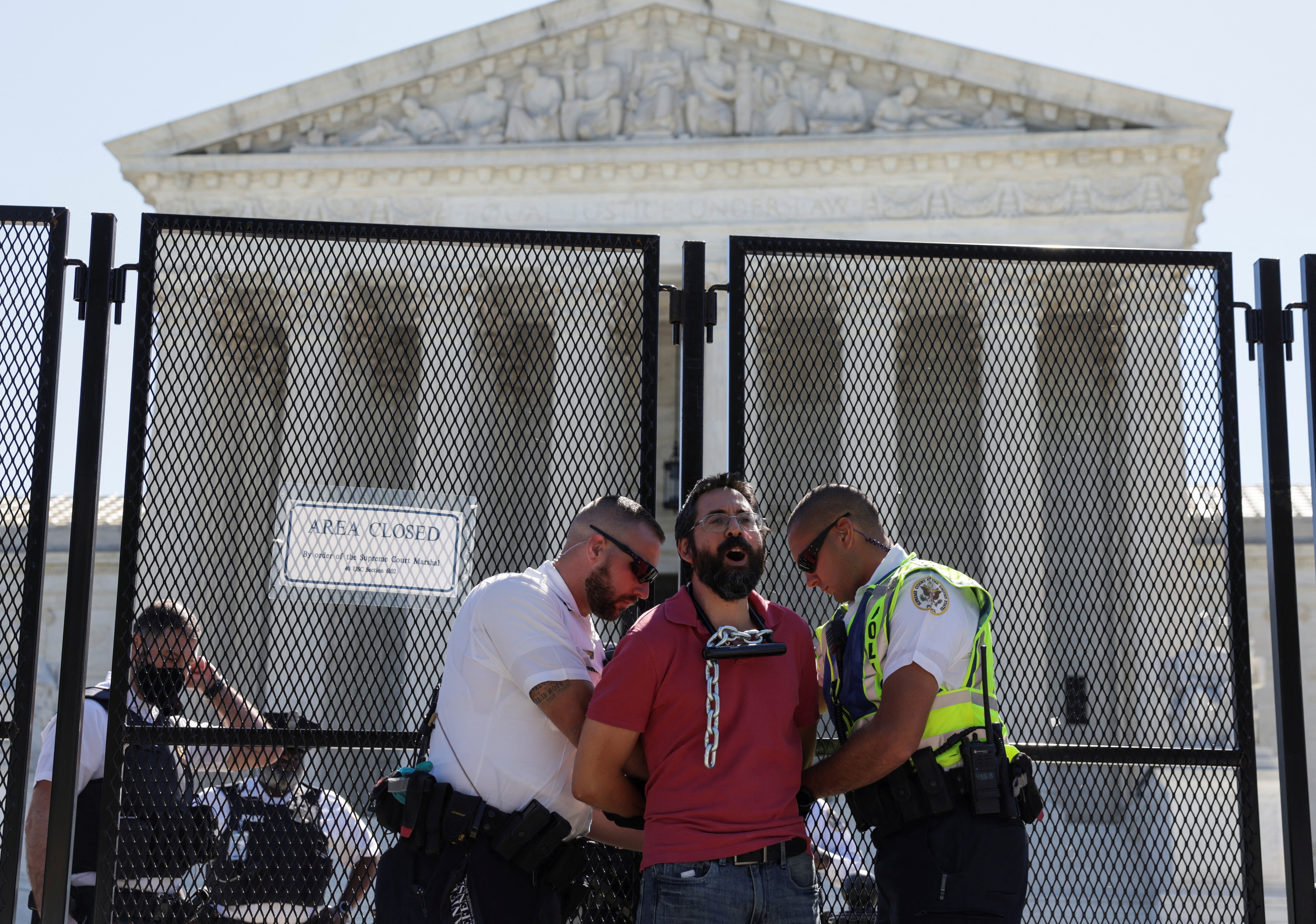 Abortion rights and anti-abortion protesters gather outside the U.S. Supreme Court in Washington