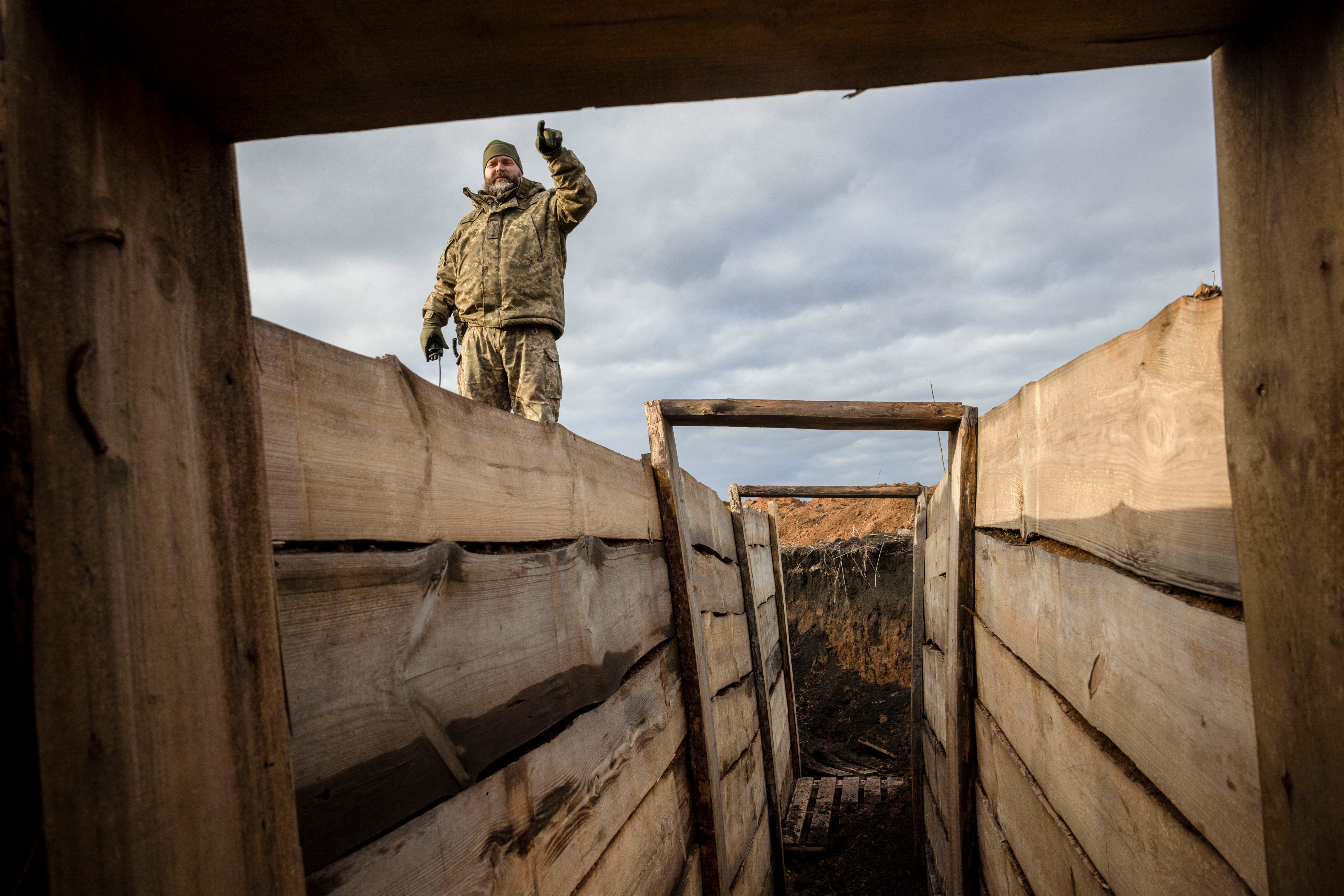 Ukraine builds barricades, digs trenches as focus shifts to defence