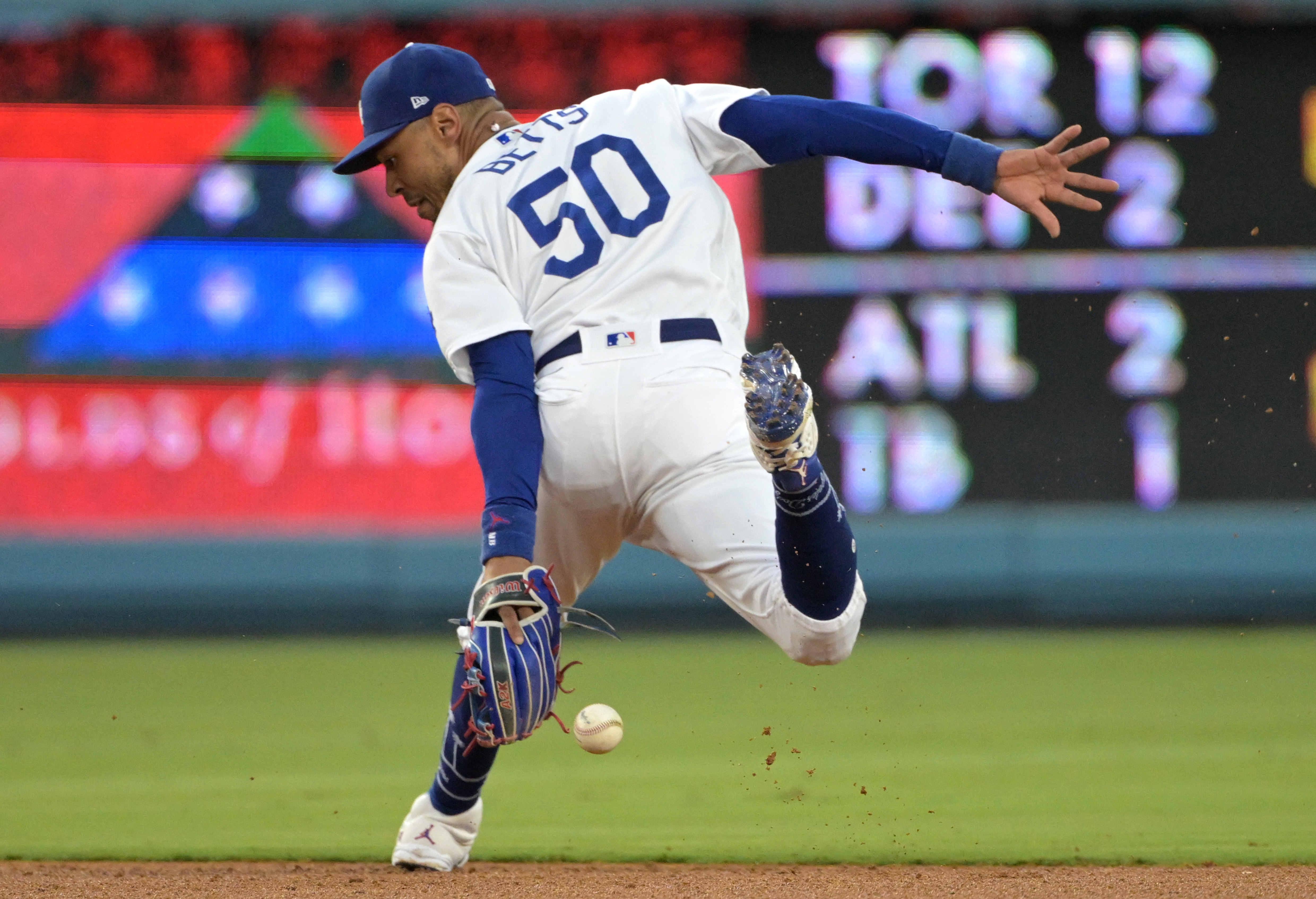 LOS ANGELES, CA - JULY 05 :Los Angeles Dodgers Mookie Betts (50) celebrates  his home run in the third inning against the Colorado Rockies at Dodger  Stadium on July 5, 2022 in