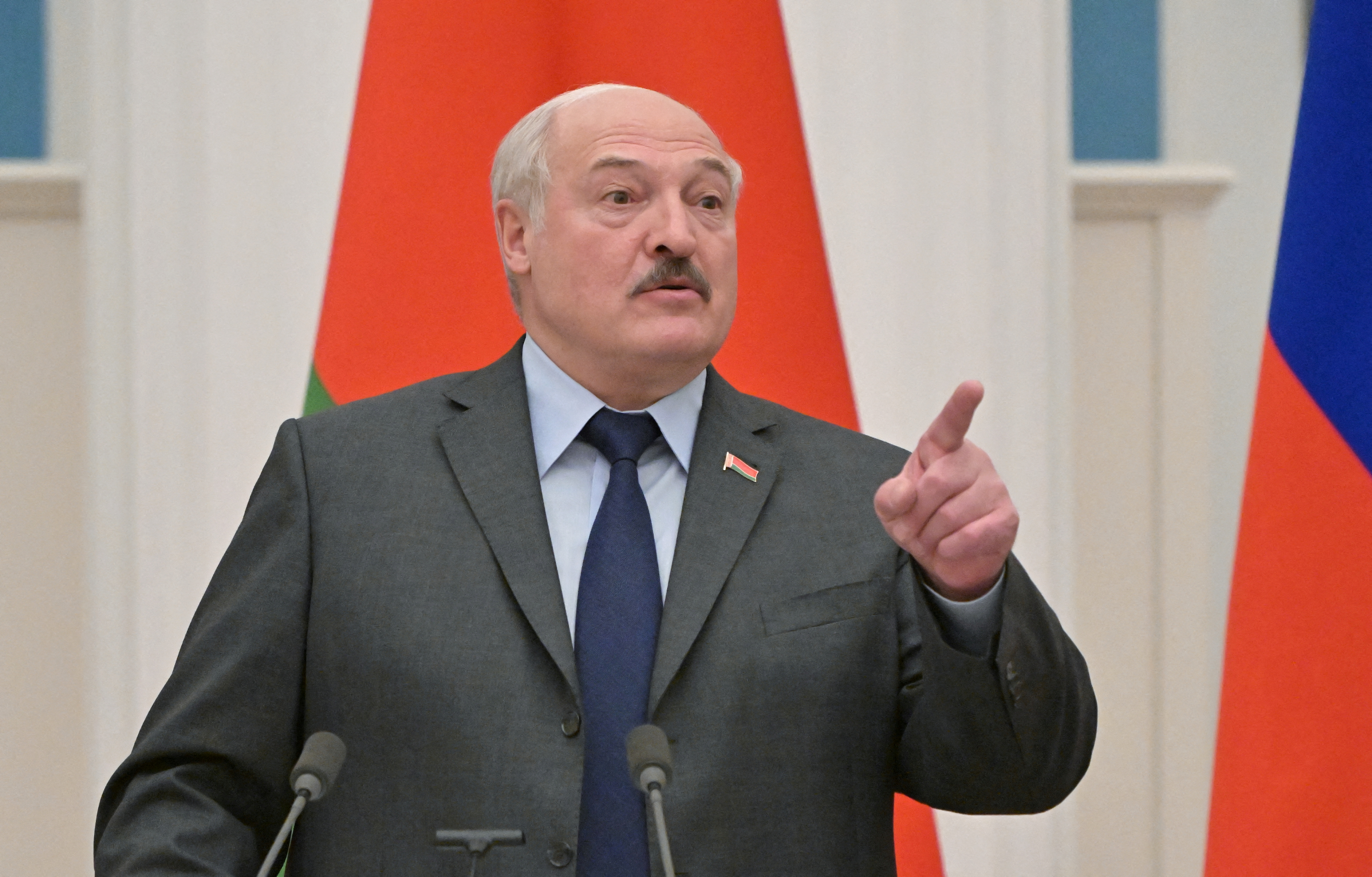 Belarusian President Alexander Lukashenko gestures during a joint news conference with Russian President Vladimir Putin in Moscow, Russia February 18, 2022