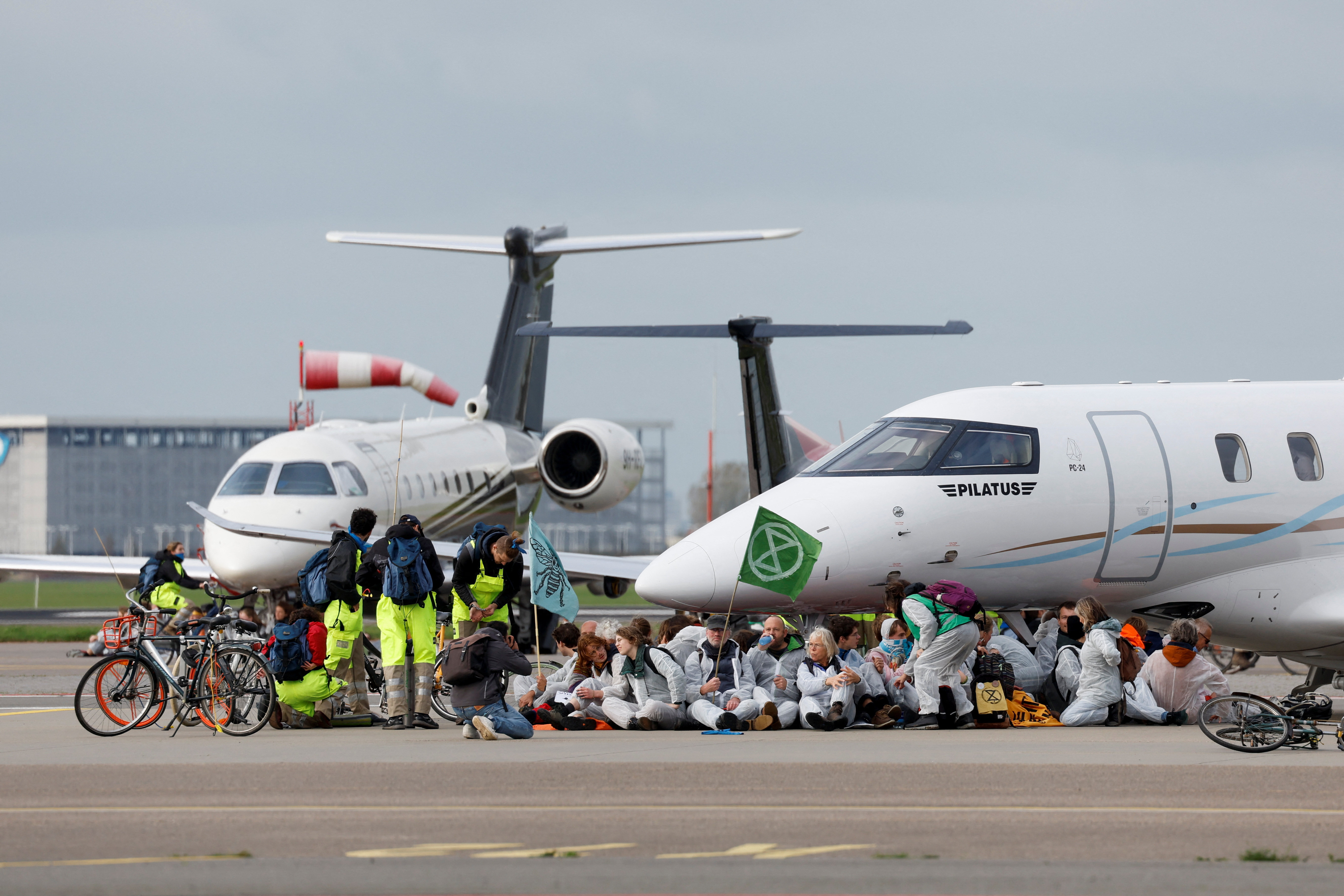 Climate activists target private jet airports and demand ban at