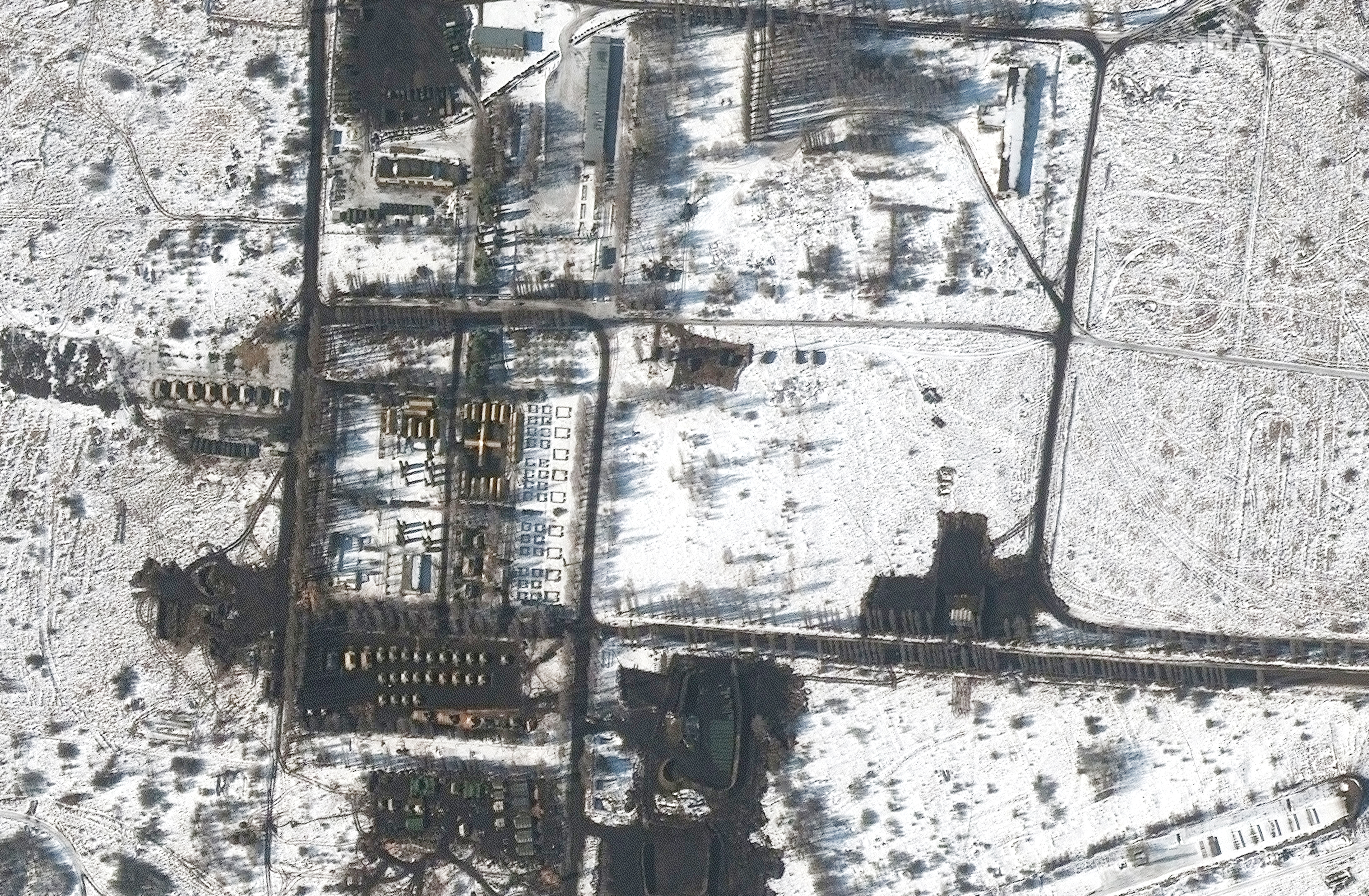 A satellite image shows an overview of a field hospital and a troop deployment, in Belgorod