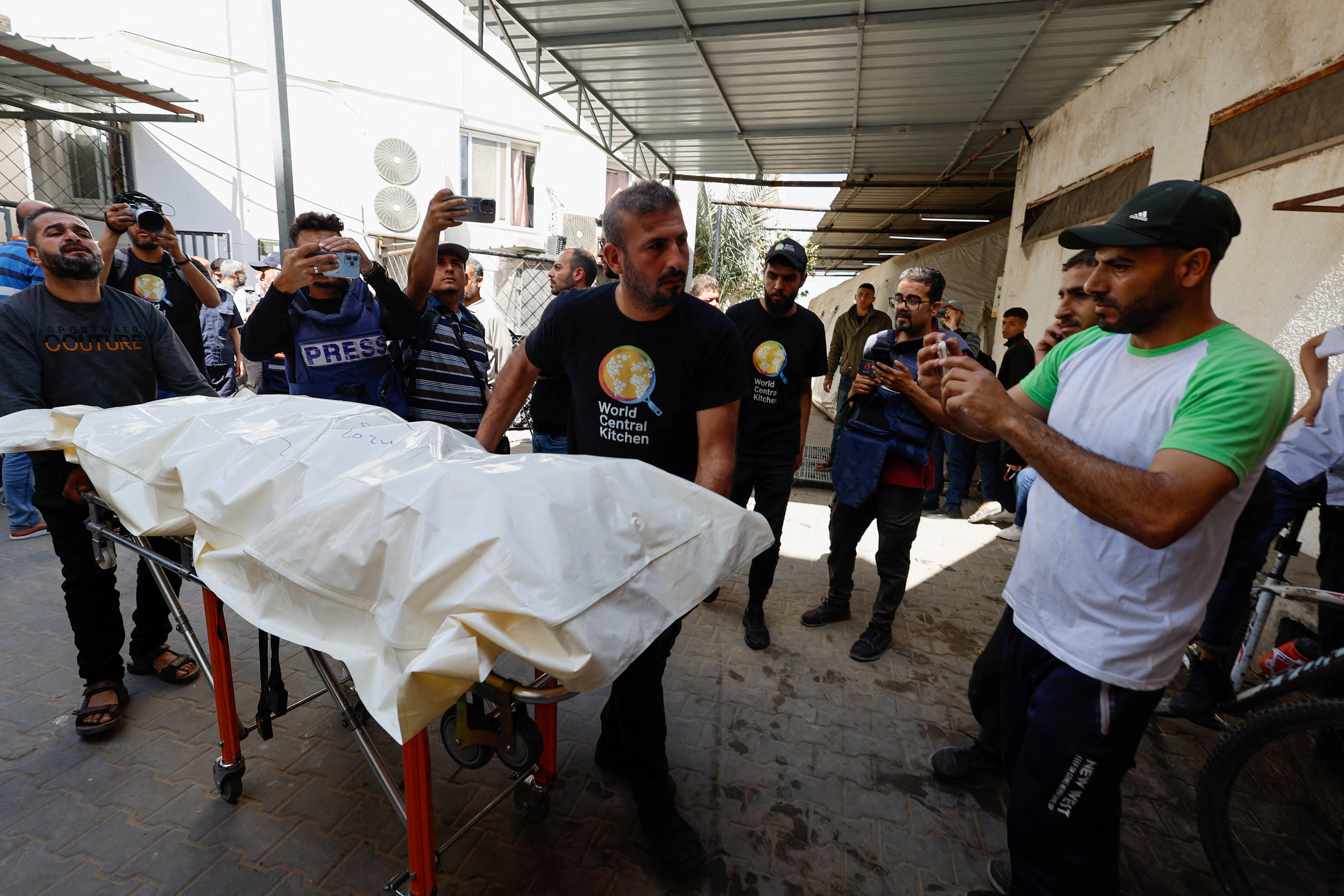 Bodies of foreign WCK workers killed in an Israeli strike are transported to their families outside Gaza, in Rafah, southern Gaza Strip