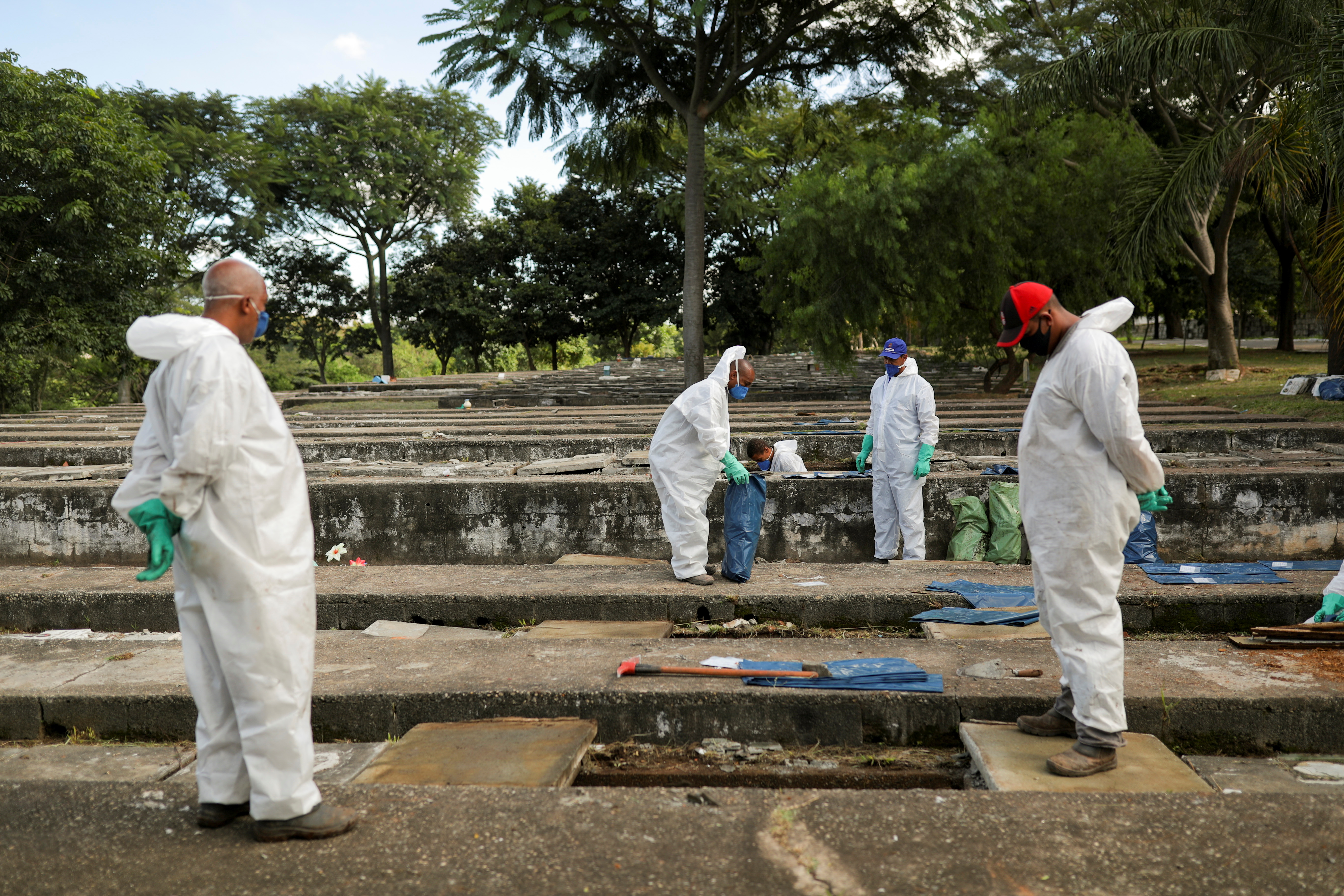 Sao Paulo exhumes old graves to make space for surging COVID-19 burials |  Reuters