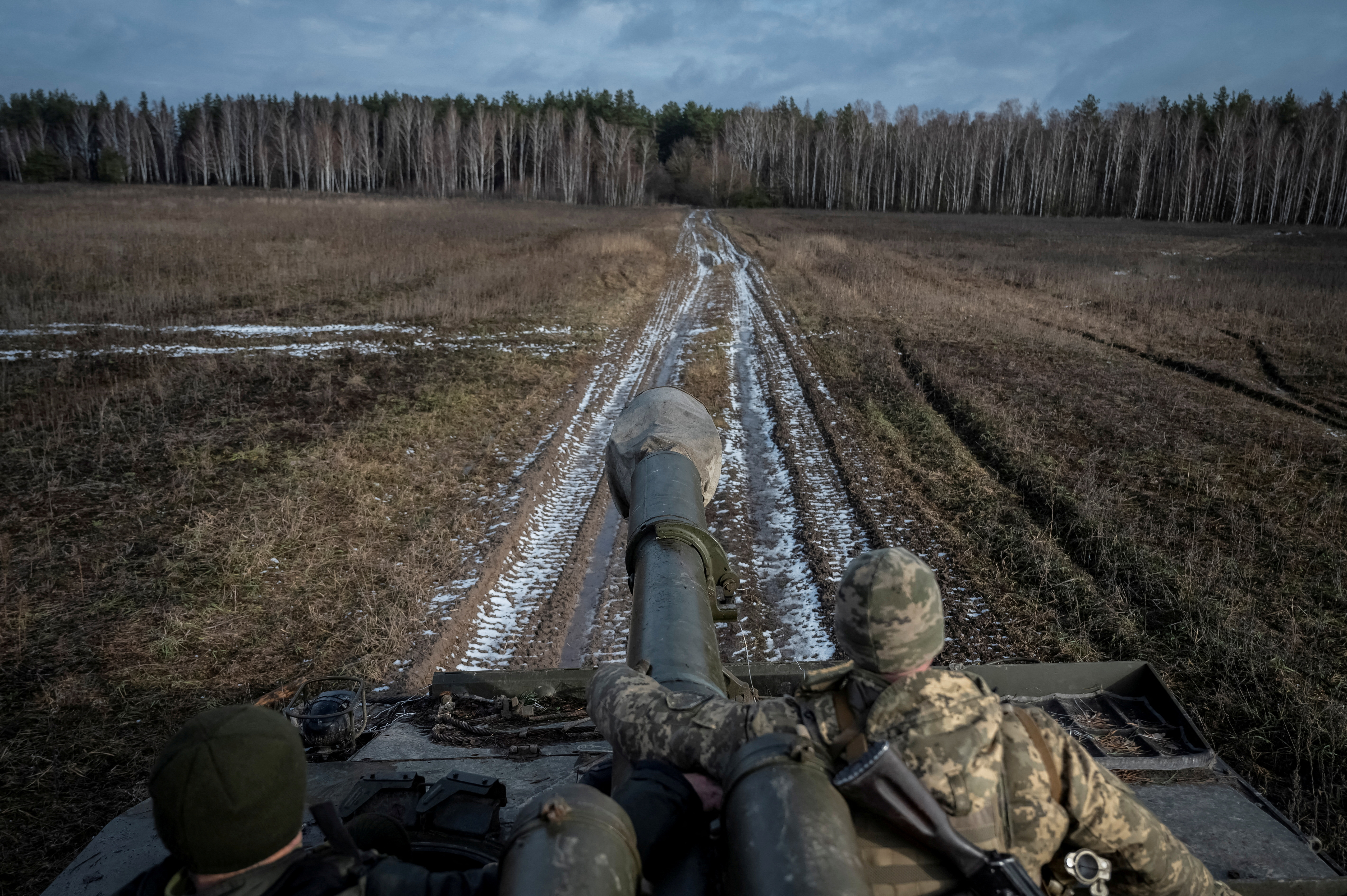 Ukrainian servicemen attend a drill of armed forces at the border with Belarus near Chornobyl