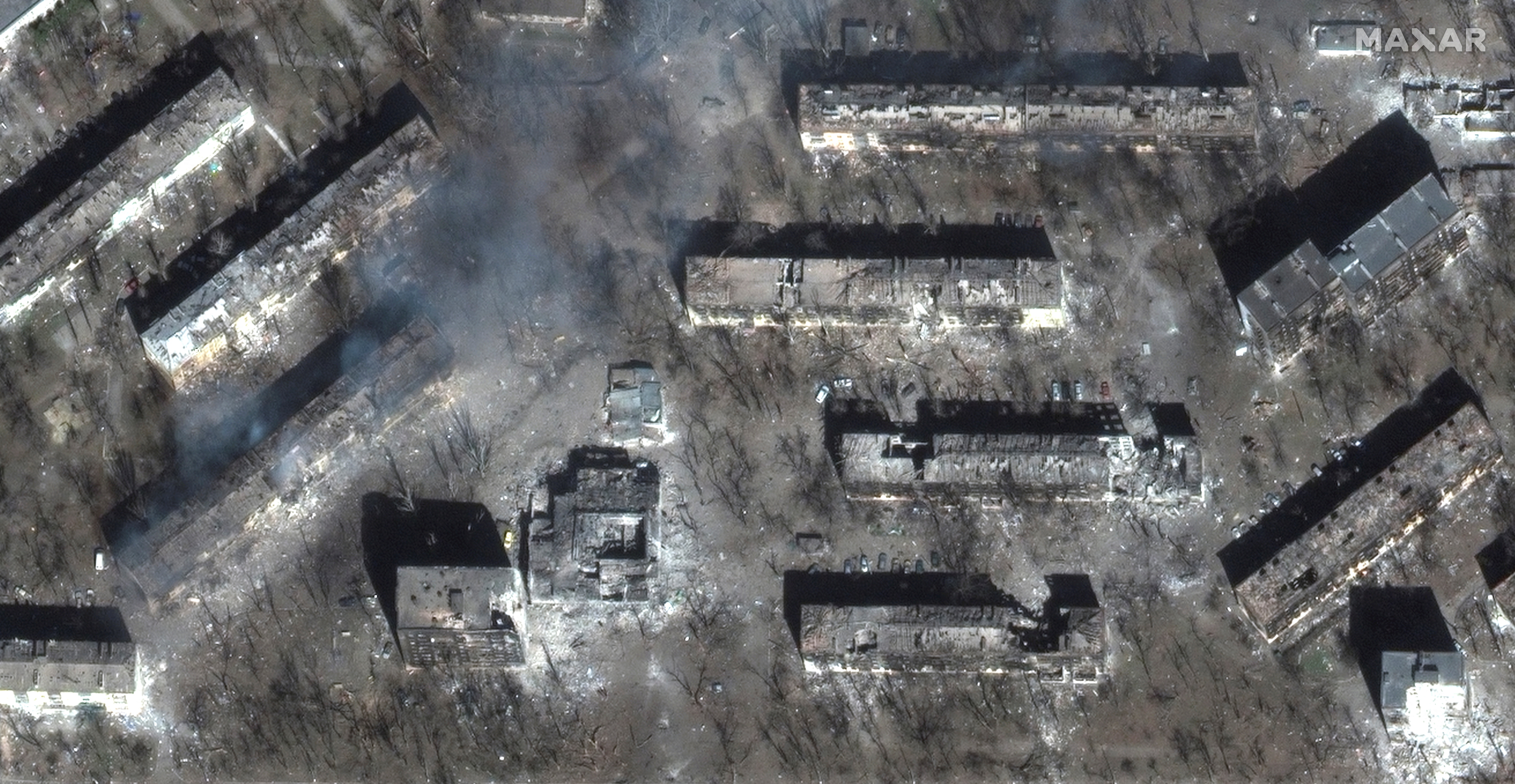 A satellite image shows devastation of residential apartment buildings, in Livoberezhnyi district, east Mariupol