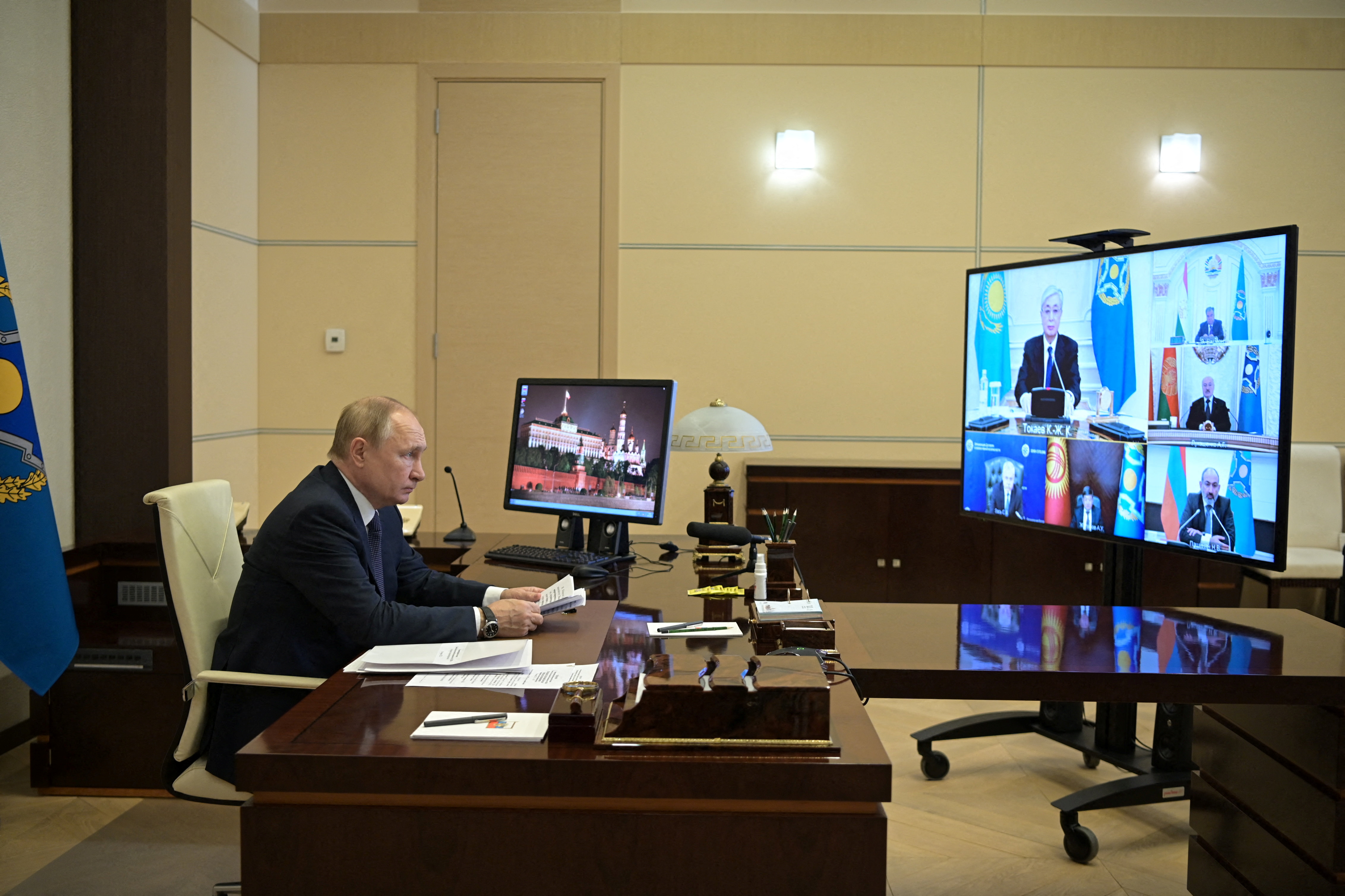 Russian President Putin attends an extraordinary meeting of CSTO leaders, via a video link outside Moscow