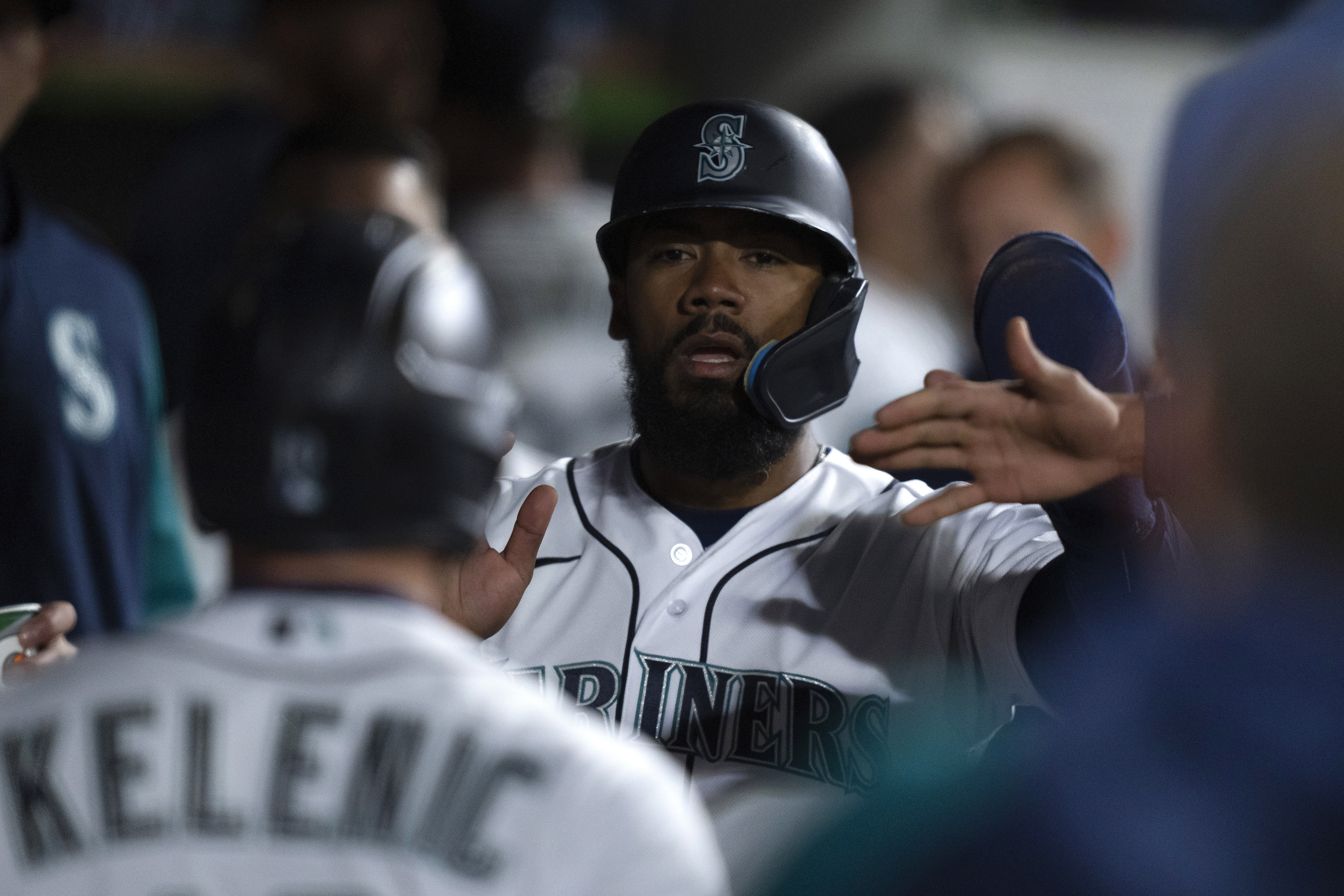 Seattle Mariners left fielder AJ Pollock (8) runs out his two-run