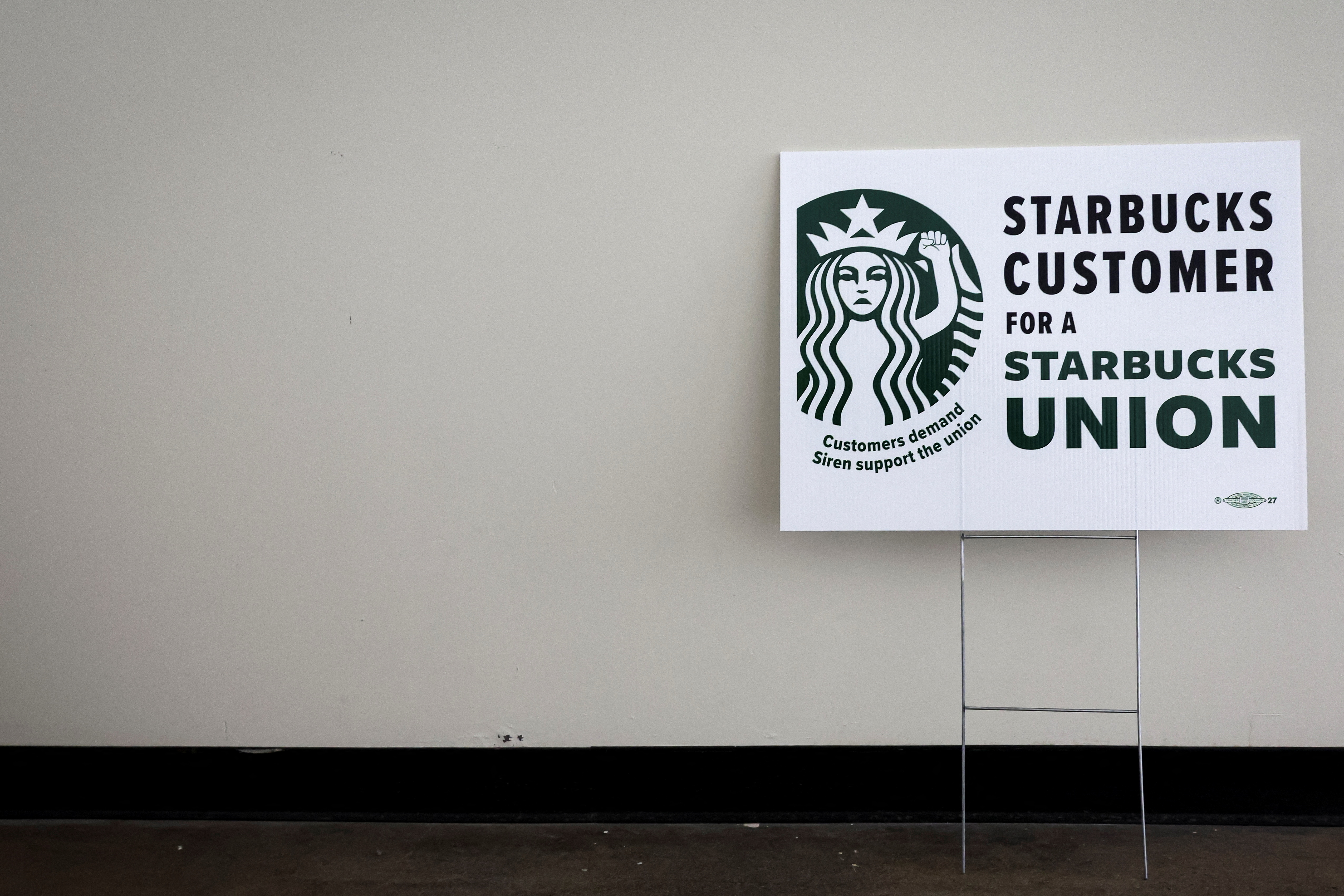 A sign showing support for a Starbucks Union is seen at the Workers United, an affiliate of the Service Employees International Union, offices in Buffalo, New York