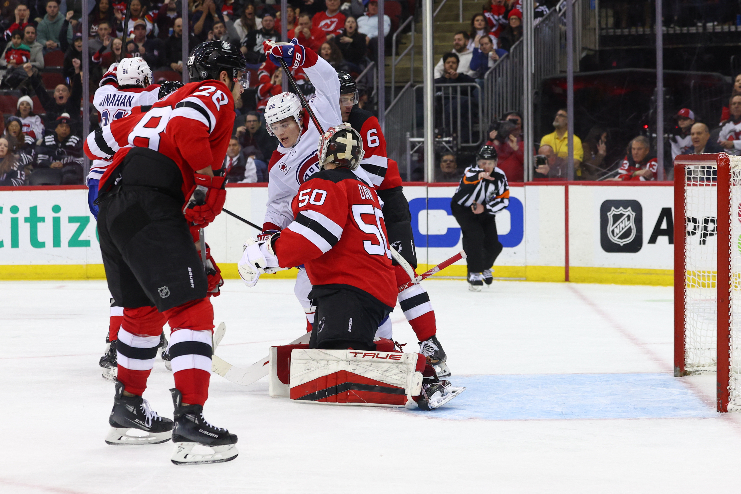 Devils rally, but Canadiens prevail on late goal | Reuters