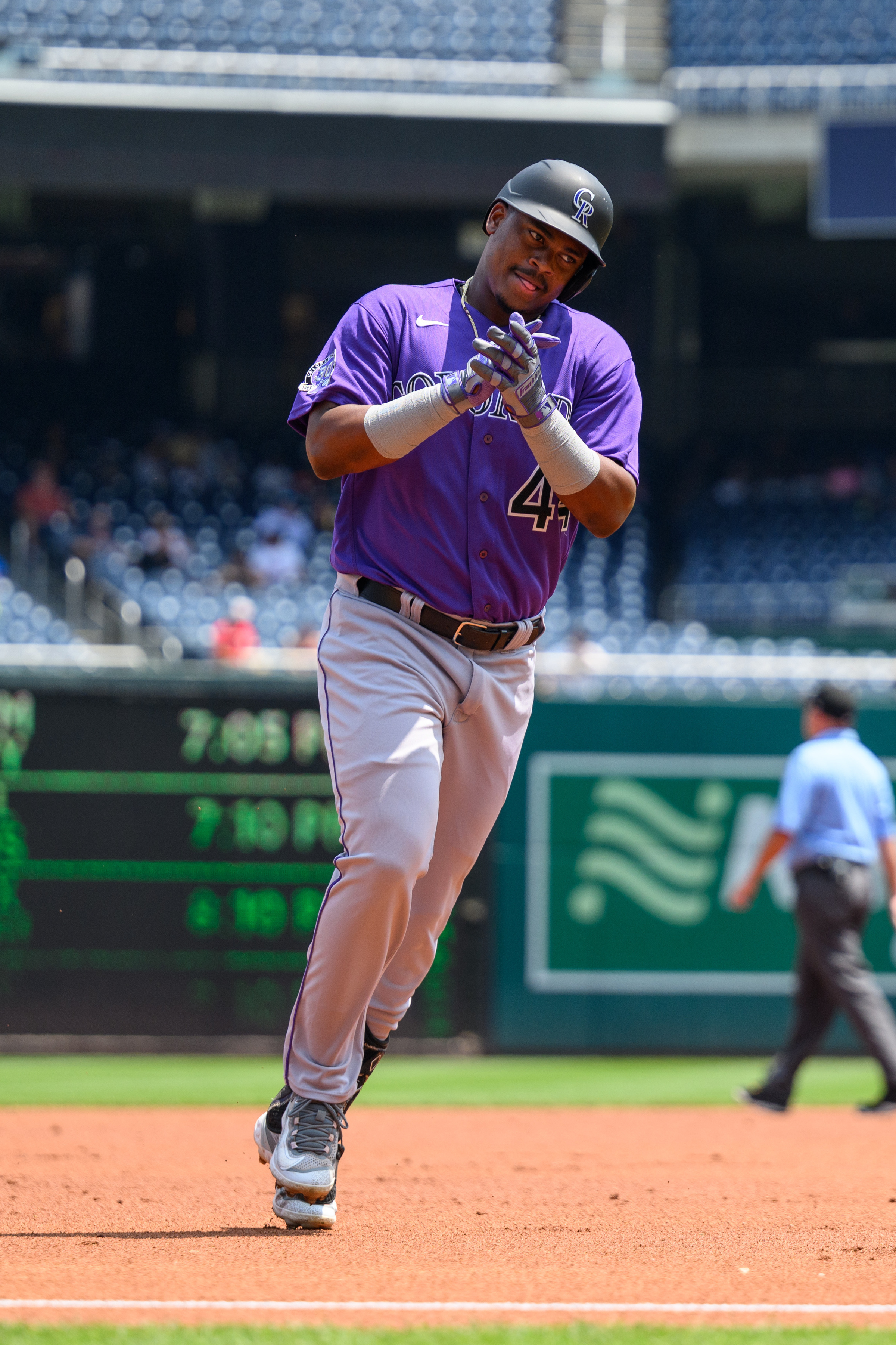 Nationals rally with 4-run ninth to edge Rockies