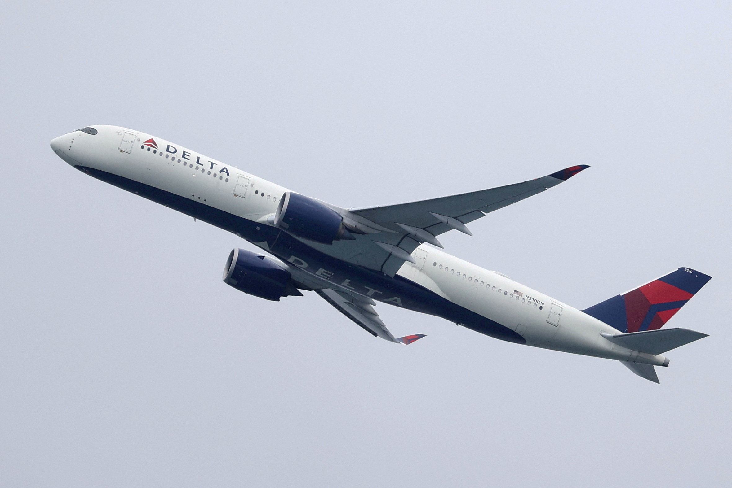 A Delta Air Lines plane takes off from Sydney Airport in Sydney