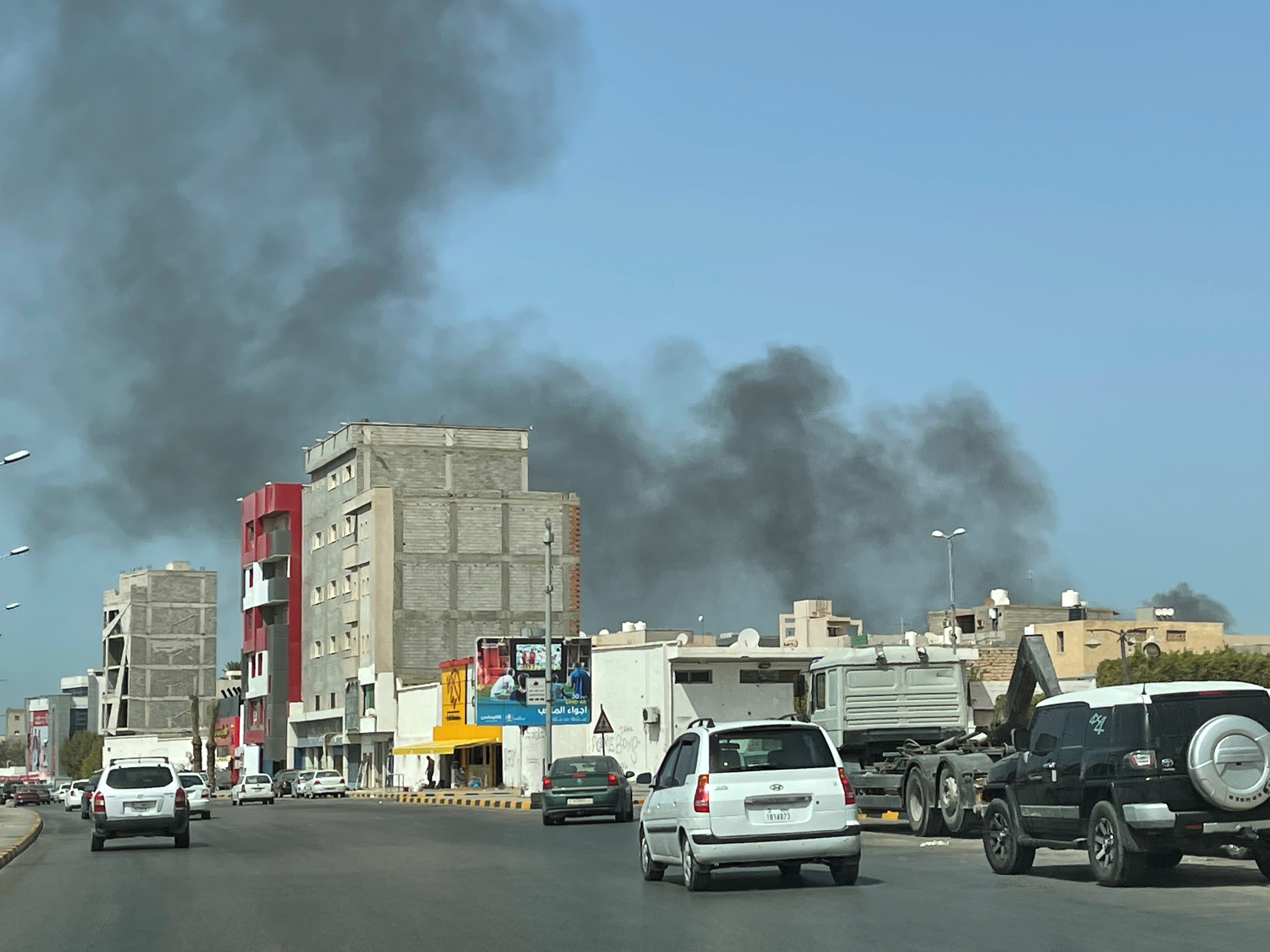Smoke rises after an attack on Administrative Control Authority in Tripoli