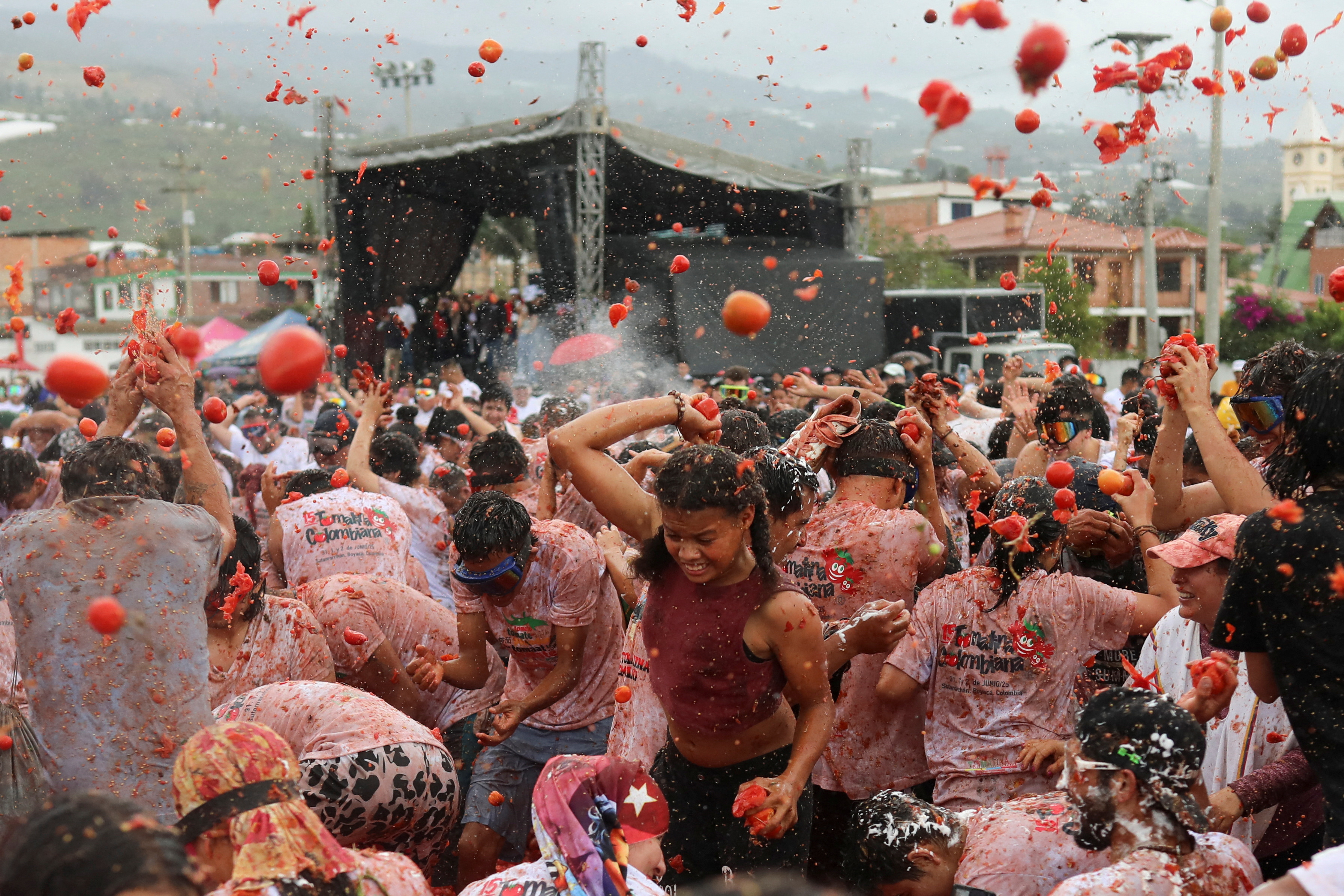 Tomatoes fly during Colombia's Gran Tomatina festival - June 2