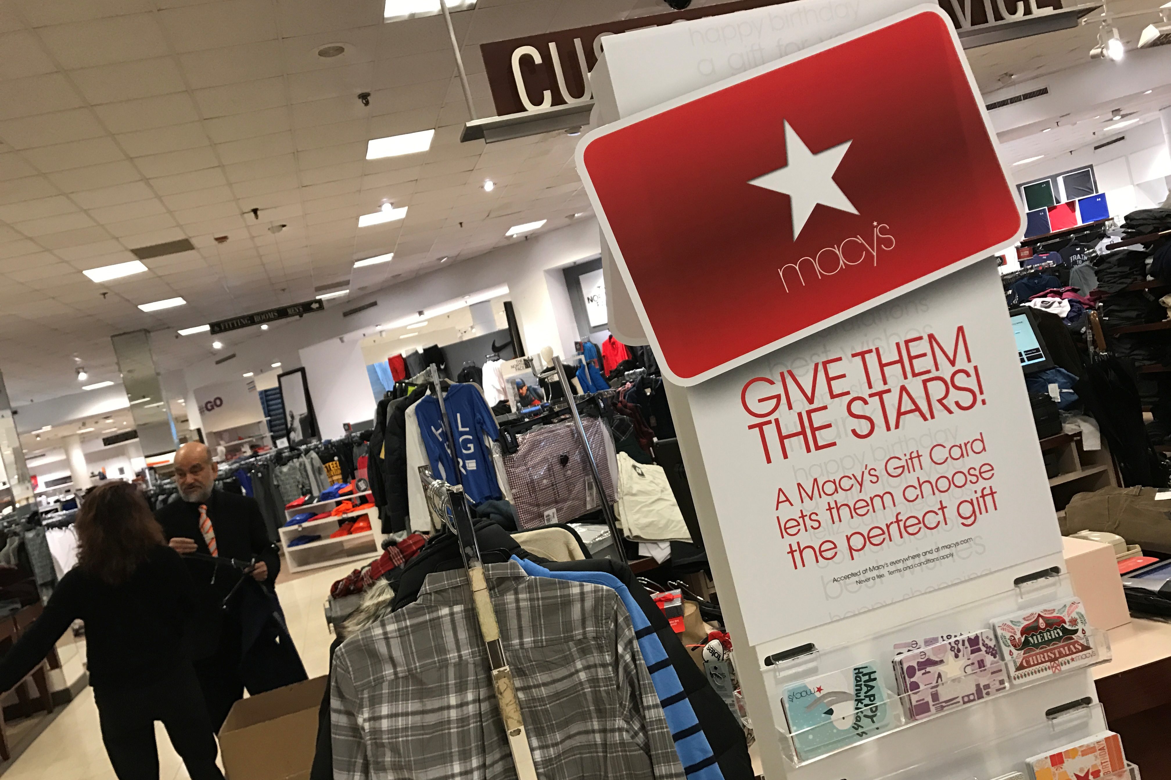 Macy's, Nordstrom cut profit views as excess inventory prompts