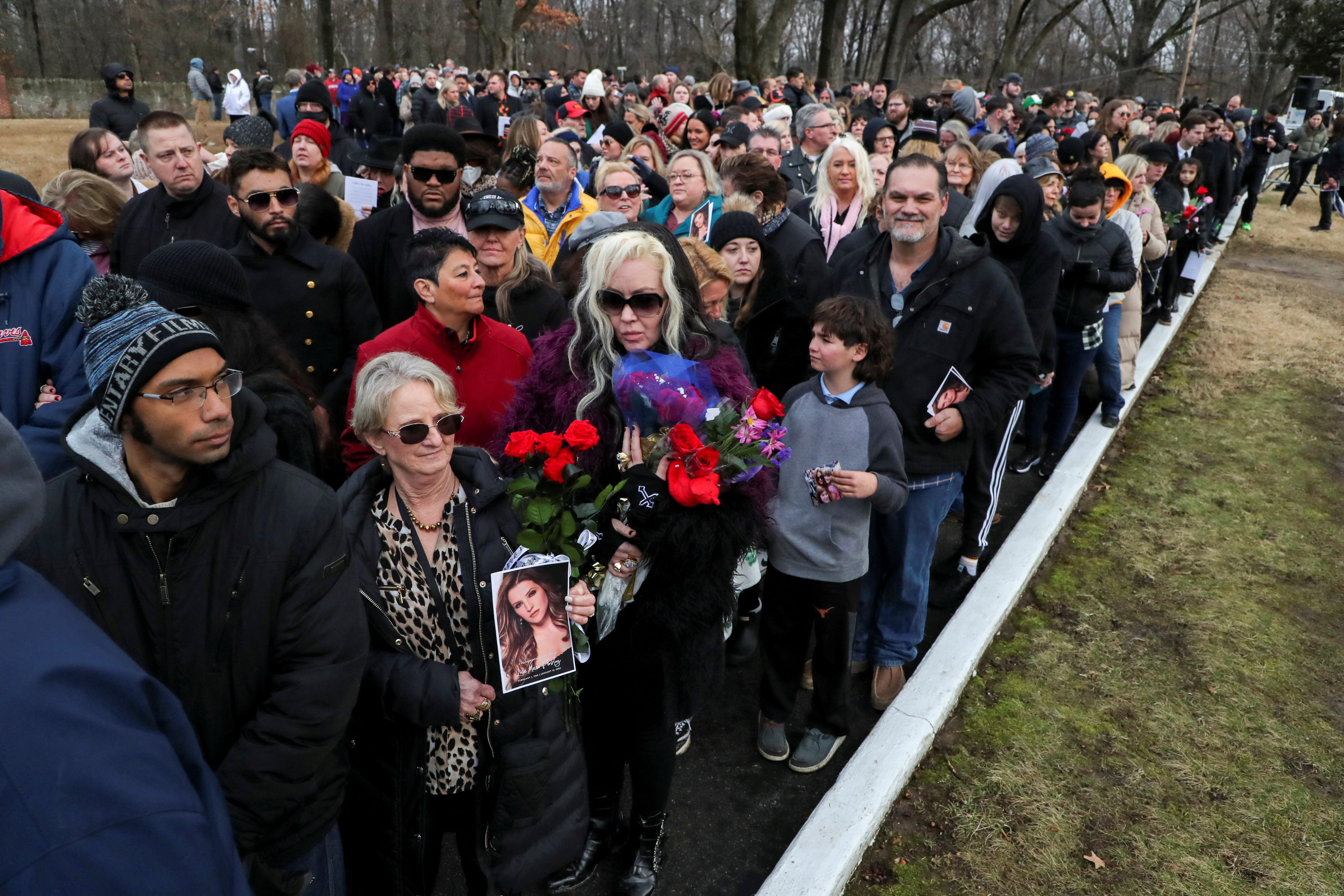Music fans attend a public memorial for singer Lisa Marie Presley at Graceland in Memphis