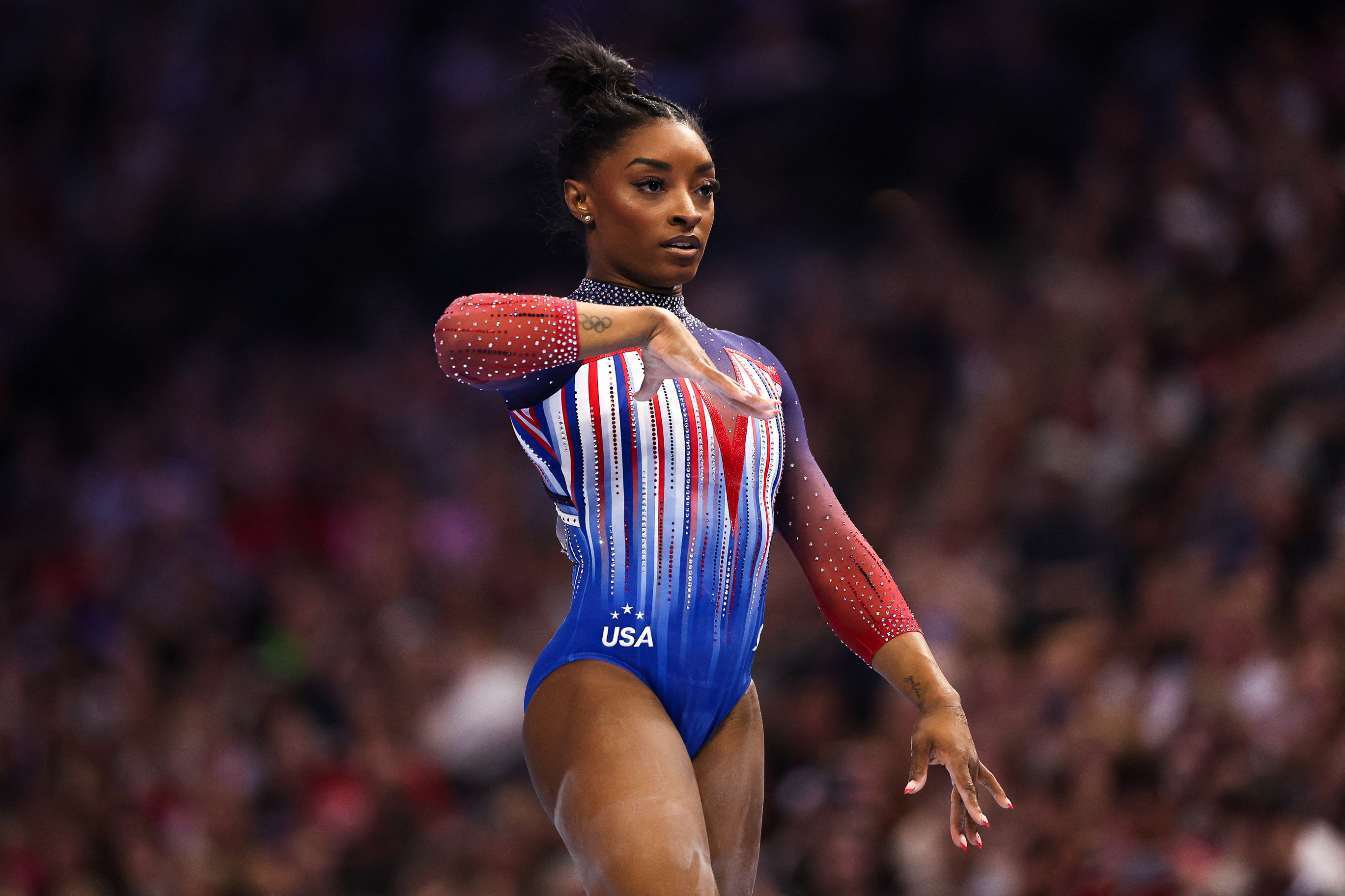 Biles soars to victory at US trials to secure spot at third Games Reuters