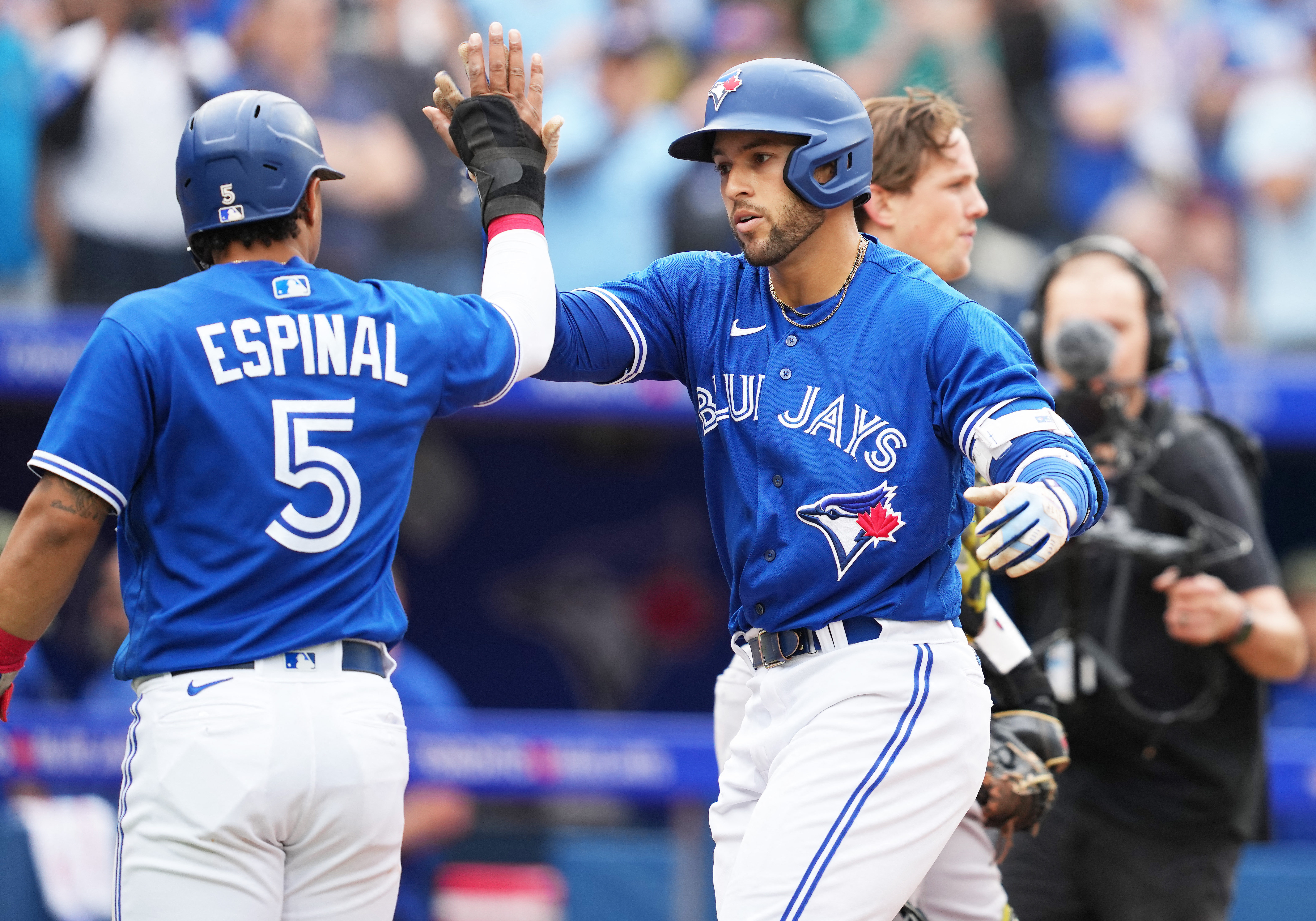 Baltimore Orioles' Adam Frazier and Blue Jays' Alek Manoah