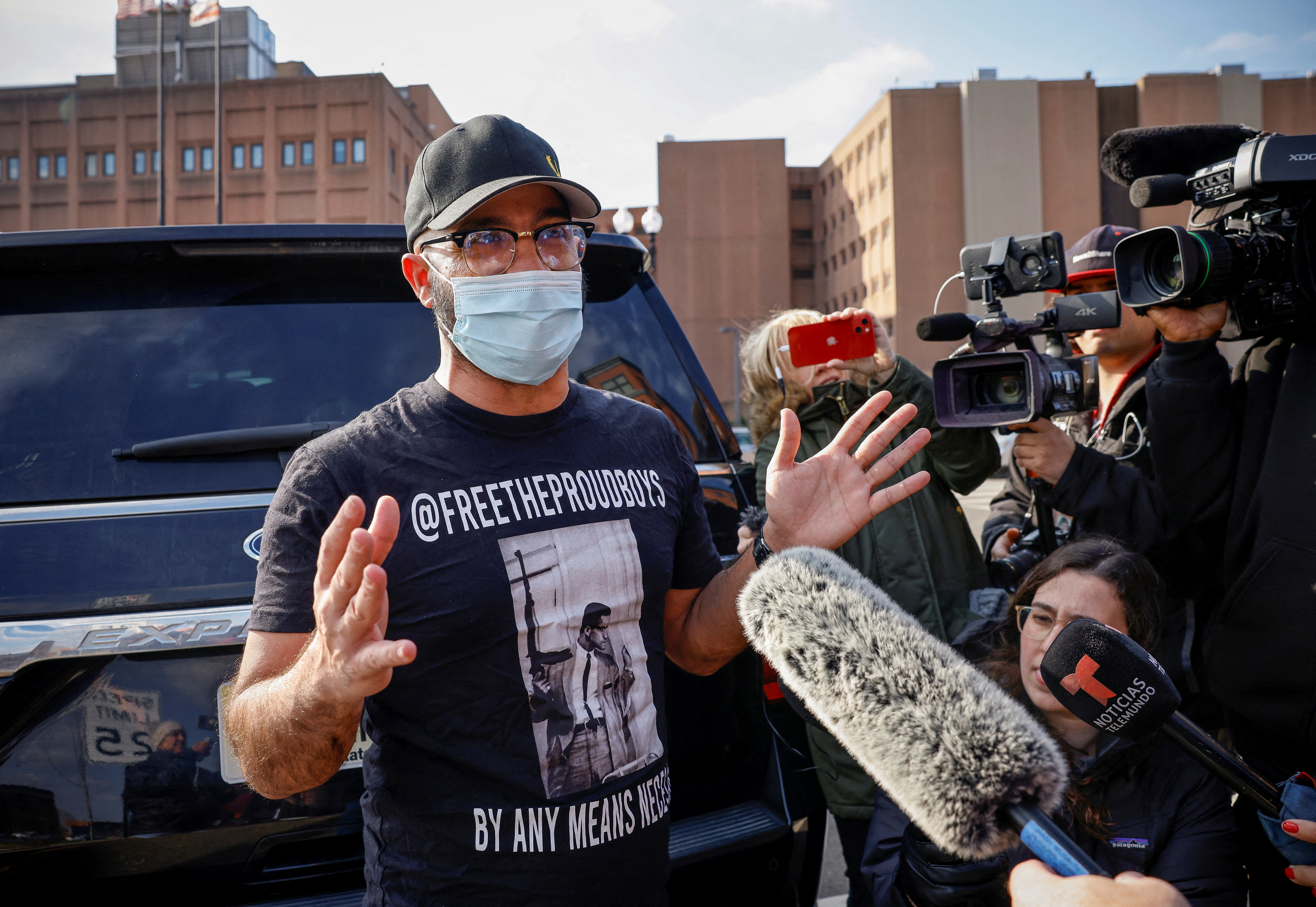 Proud Boys leader Enrique Tarrio speaks to the media following his release from the D.C. Central Detention Facility where he has been held since September 2021, in Washington, U.S., January 14, 2022. REUTERS/Evelyn Hockstein