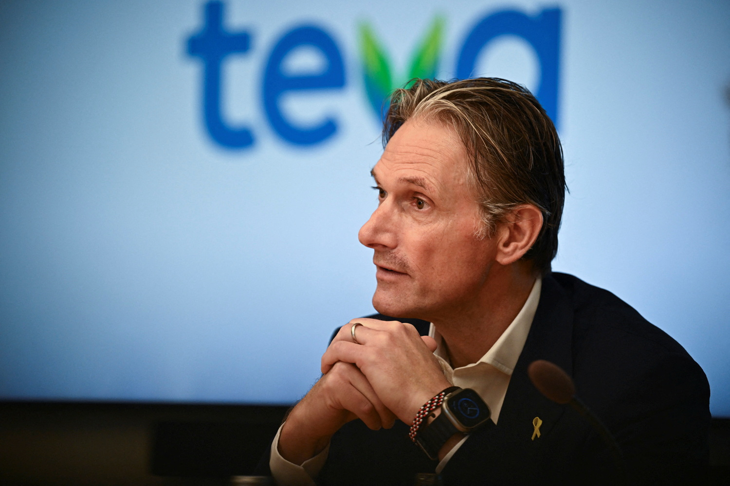 Richard Francis, Chief Executive of Teva Pharmaceutical Industries, looks on during a press conference at the company headquarters in Tel Aviv