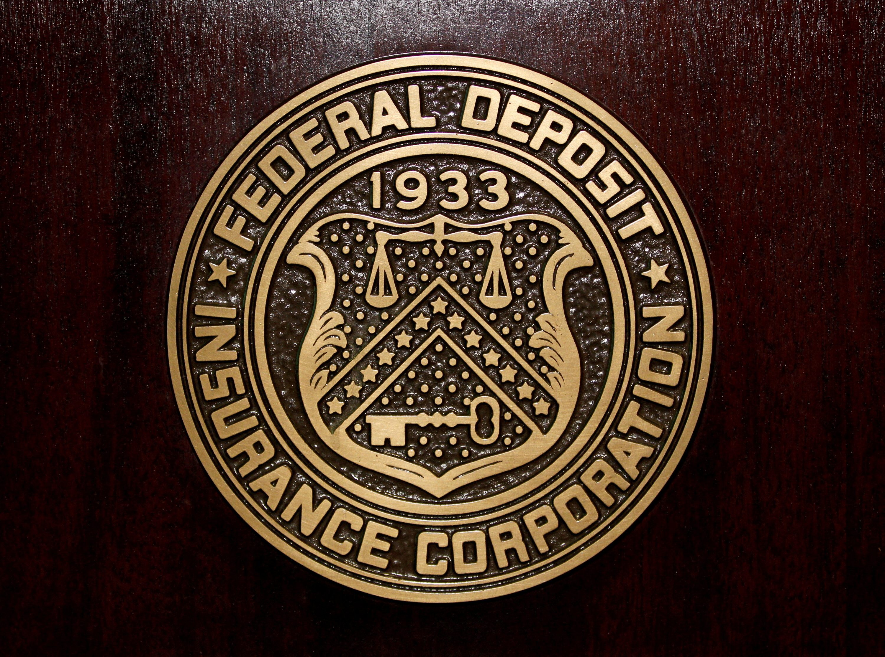 The Federal Deposit Insurance Corp logo is seen at the FDIC headquarters in Washington