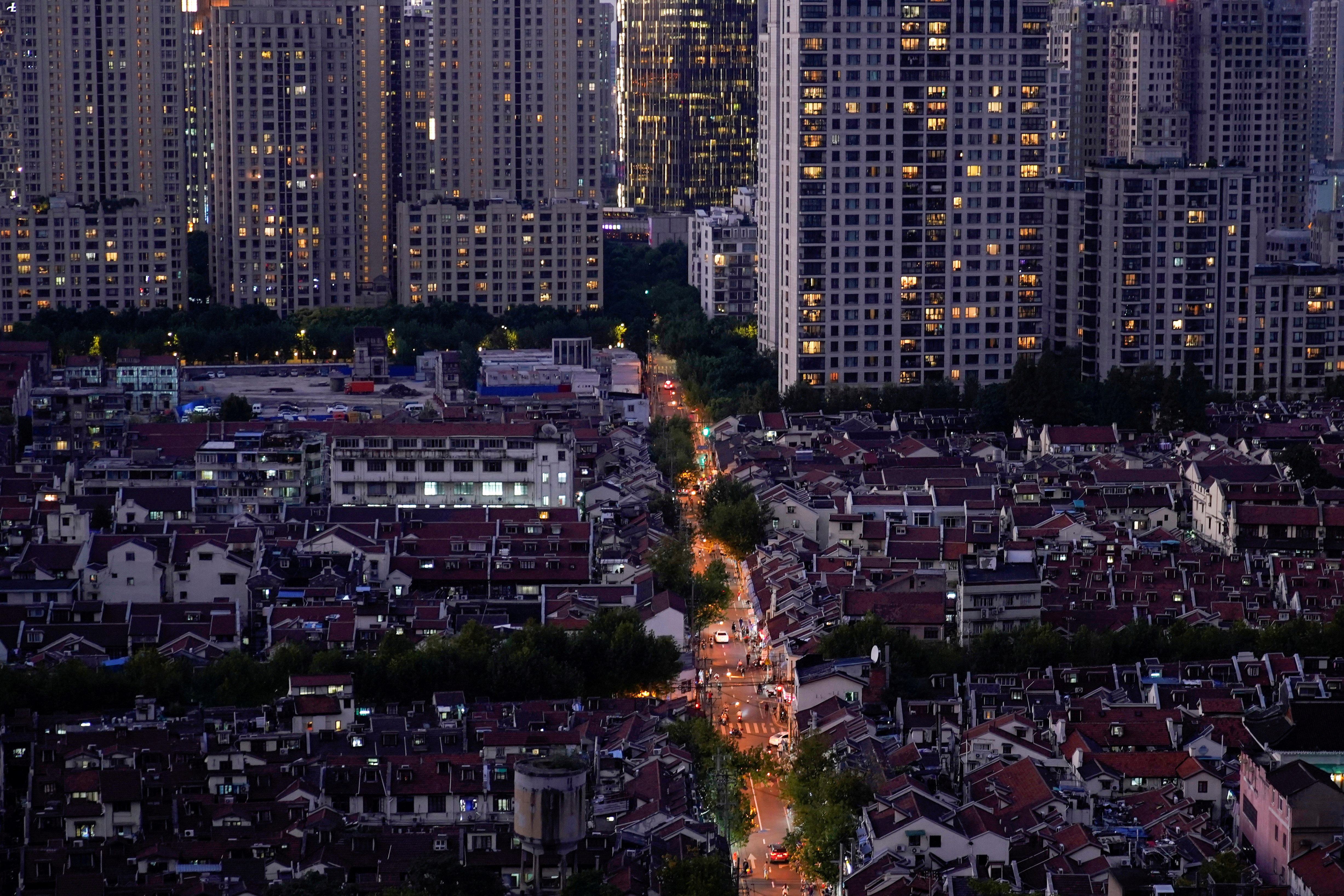 Buildings of residential compounds are seen in Shanghai