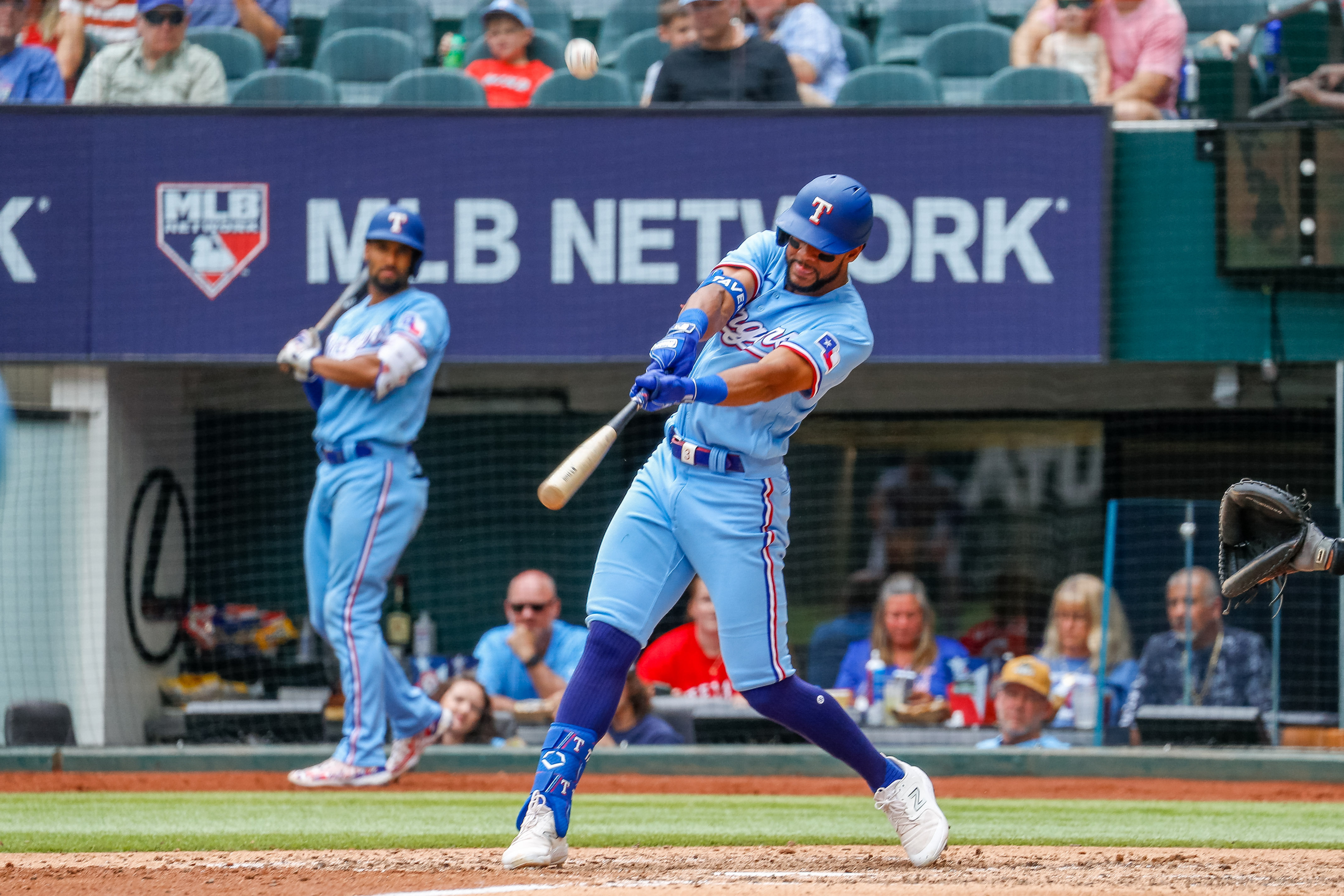 Rangers flex muscles in 13-3 rout to sweep Rockies