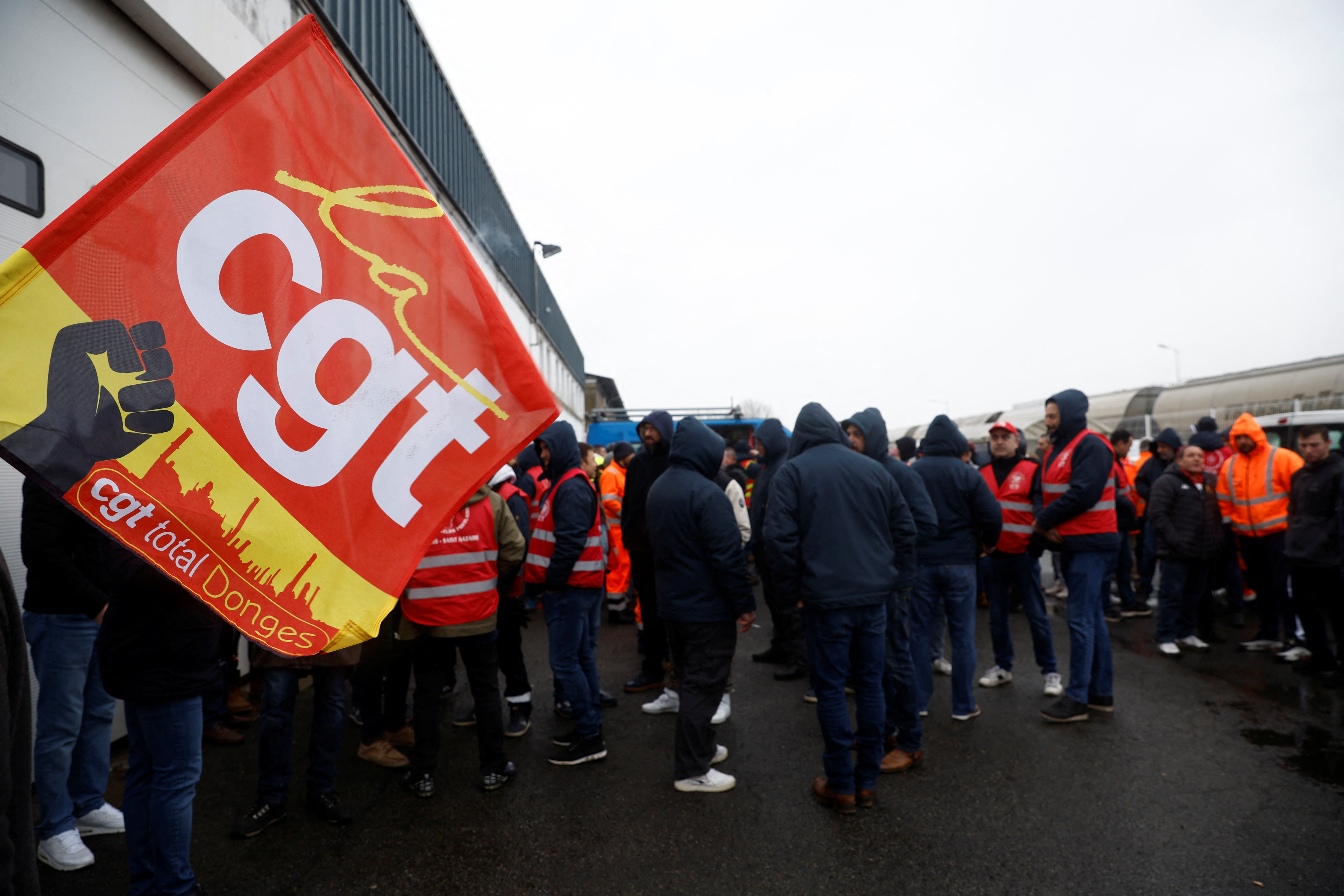 French energy workers on strike gather with dockers in the port of Saint-Nazaire