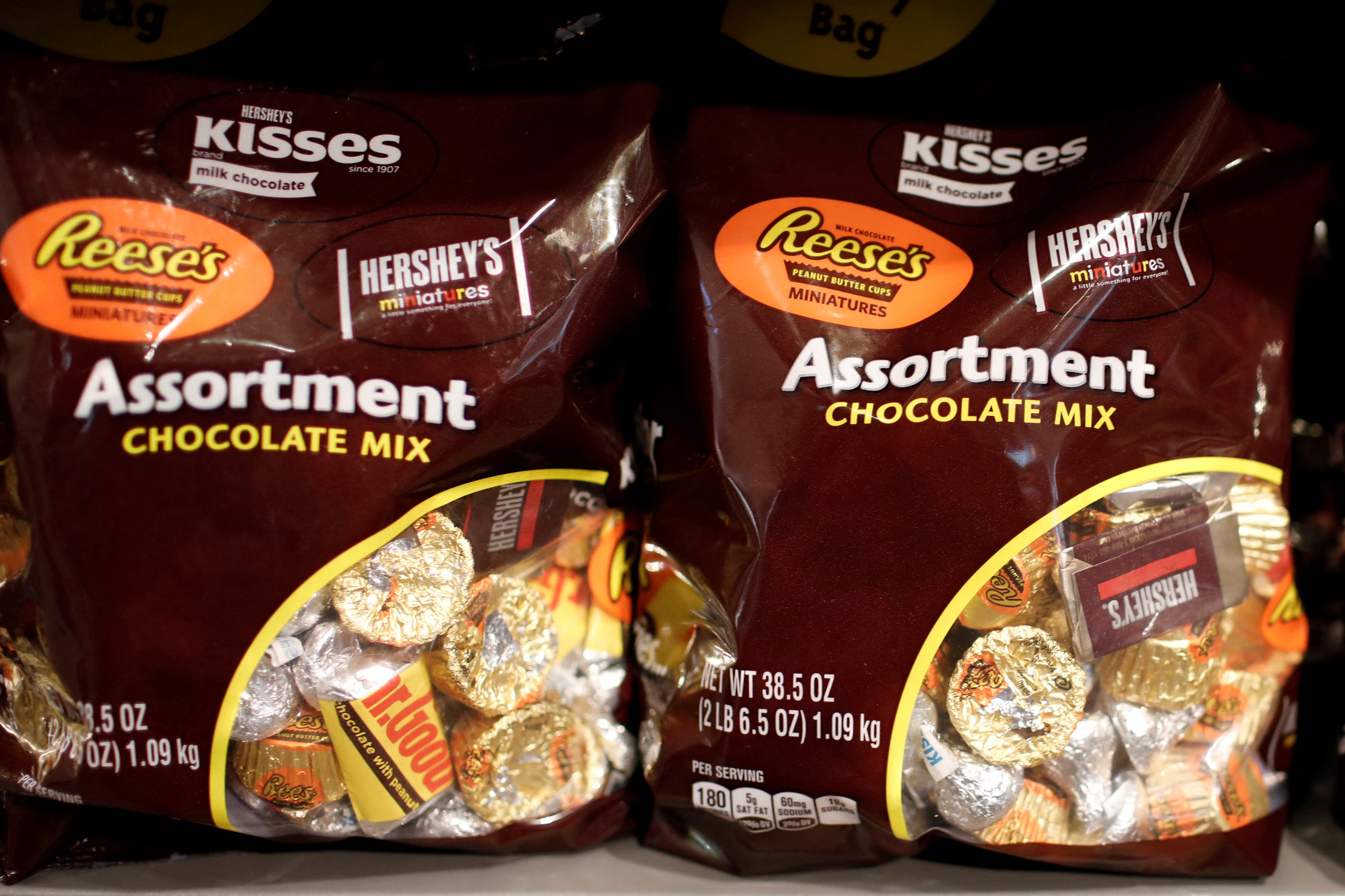 Assorted Hershey's chocolate candies are seen displayed for sale in a shop in New York City