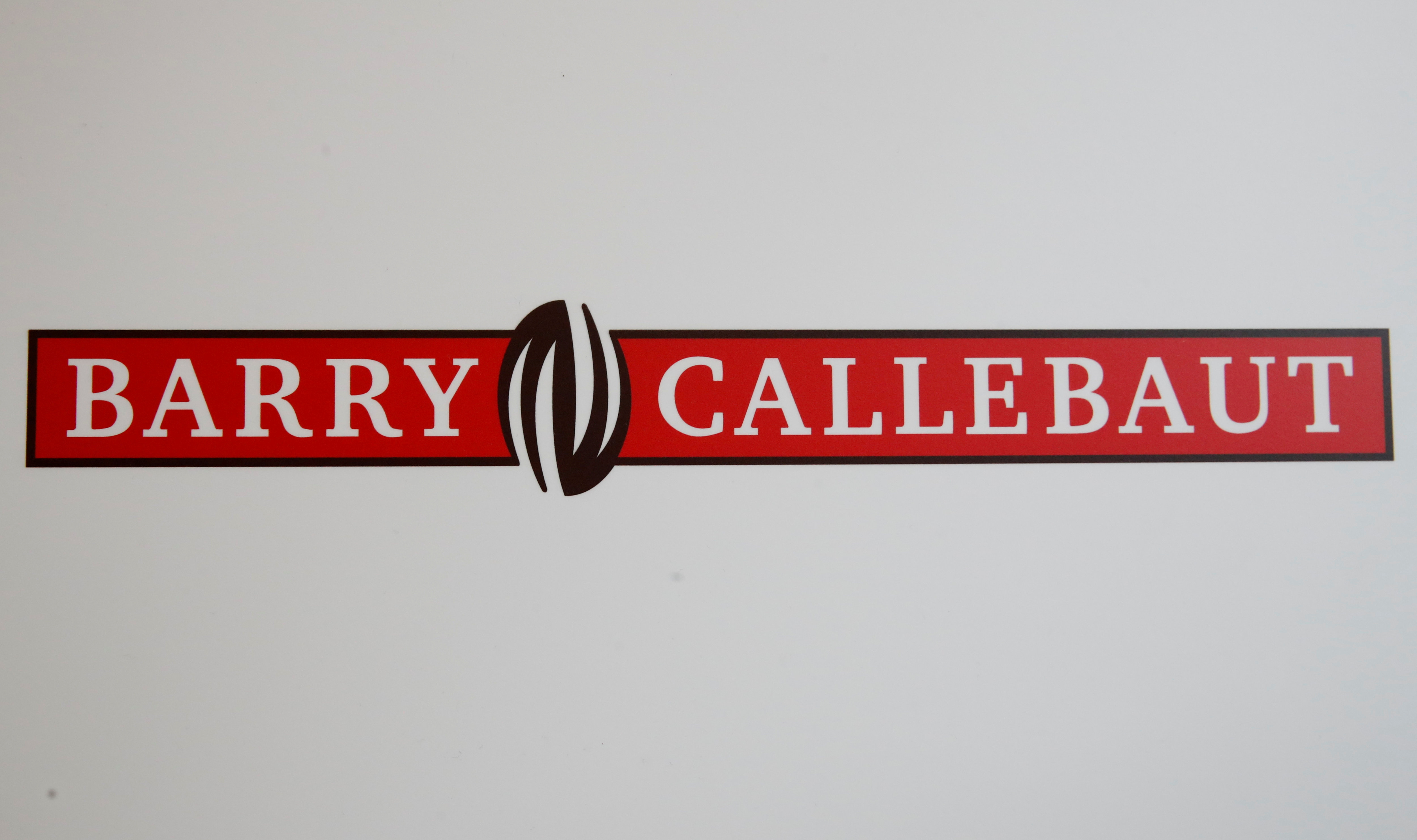 The logo of chocolate and cocoa product maker Barry Callebaut is pictured during the company's annual news conference in Zurich, Switzerland November 7, 2018. REUTERS/Arnd Wiegmann/File Photo
