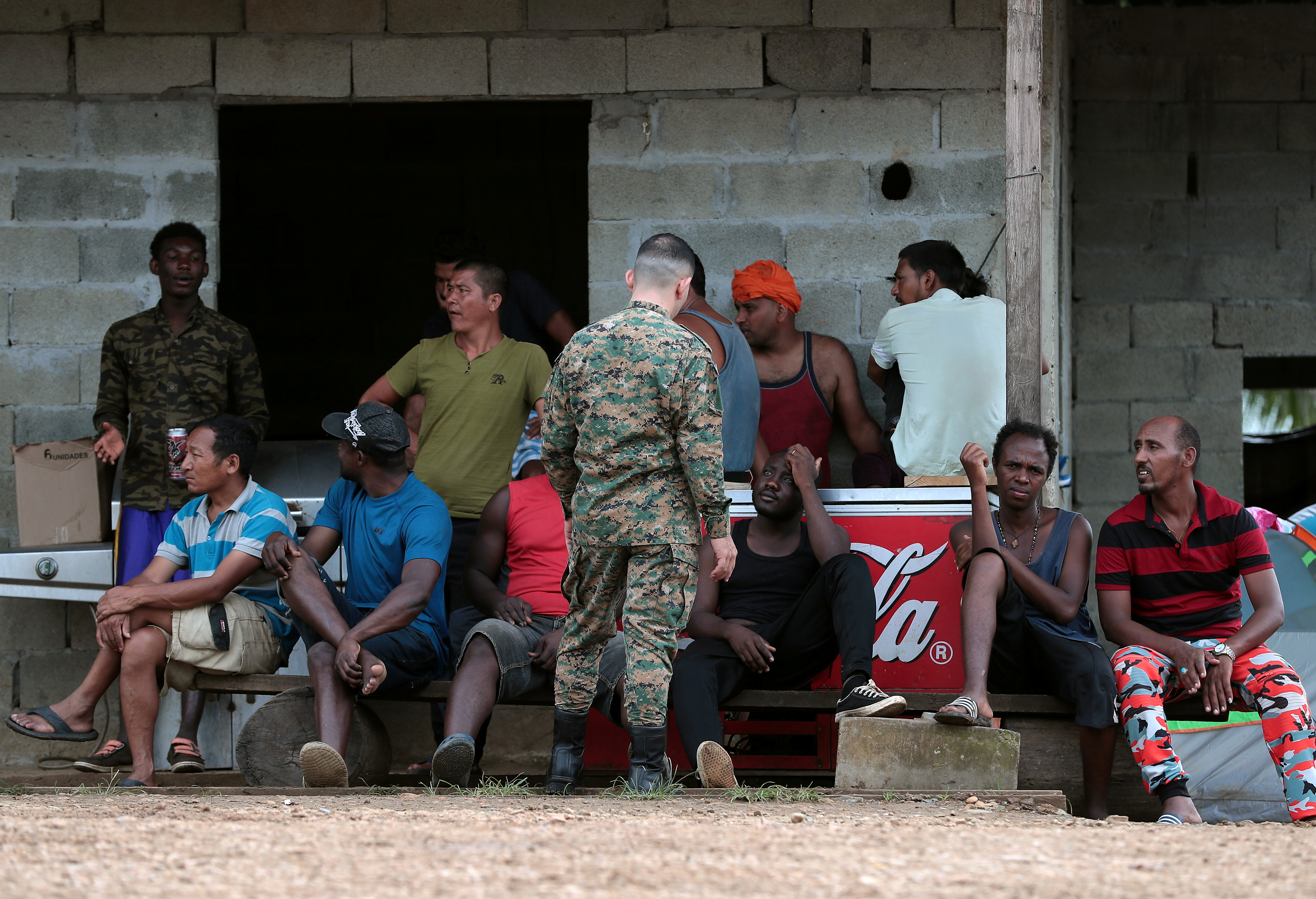 Migrants are seen at temporary shelter during acting U.S. Secretary of Homeland Security Kevin McAleenan's visit in the village of La Penita, Panama  August 23, 2019. REUTERS/Erick Marciscano