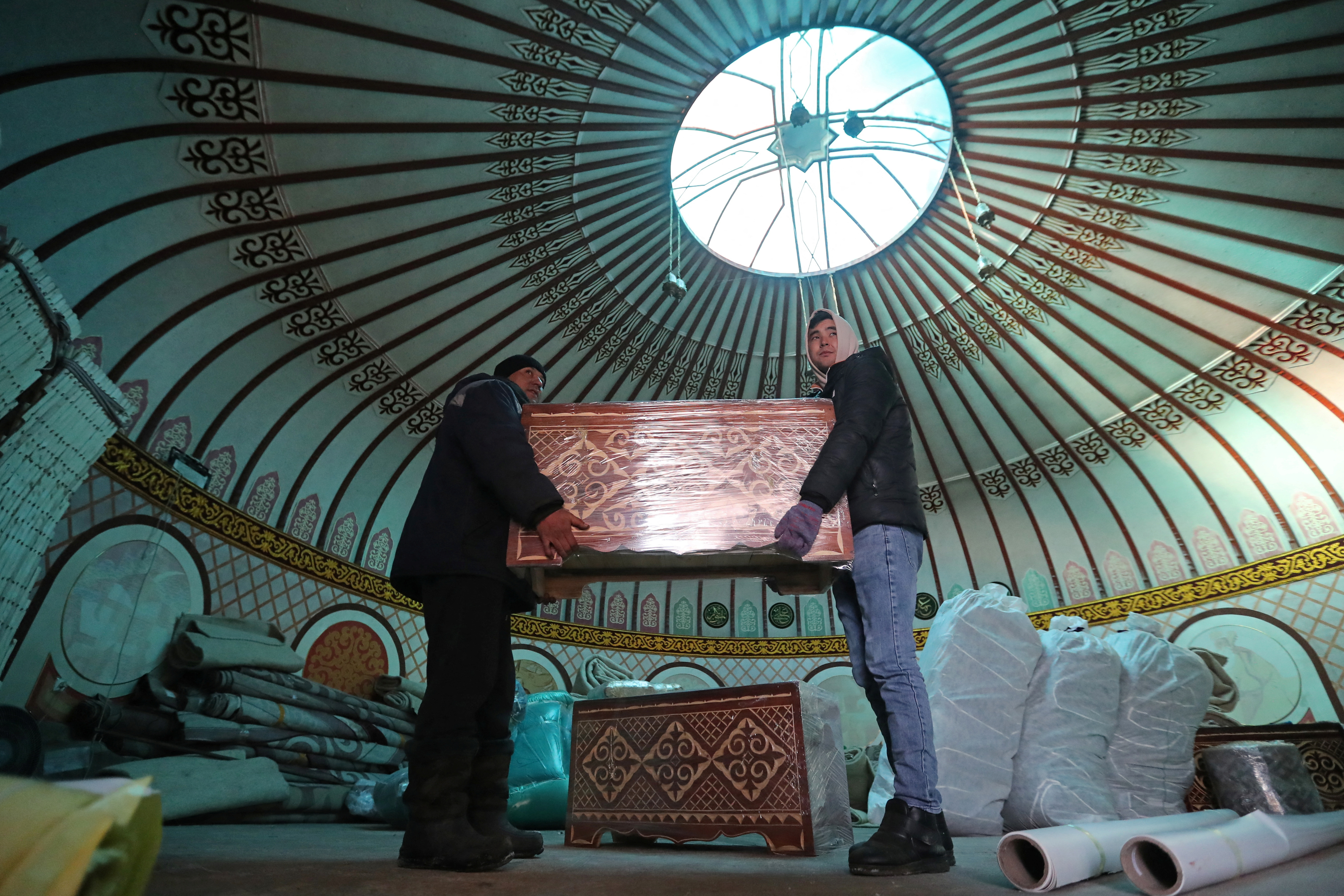 Volunteers send a batch of aid for residents of Ukraine, in Almaty region