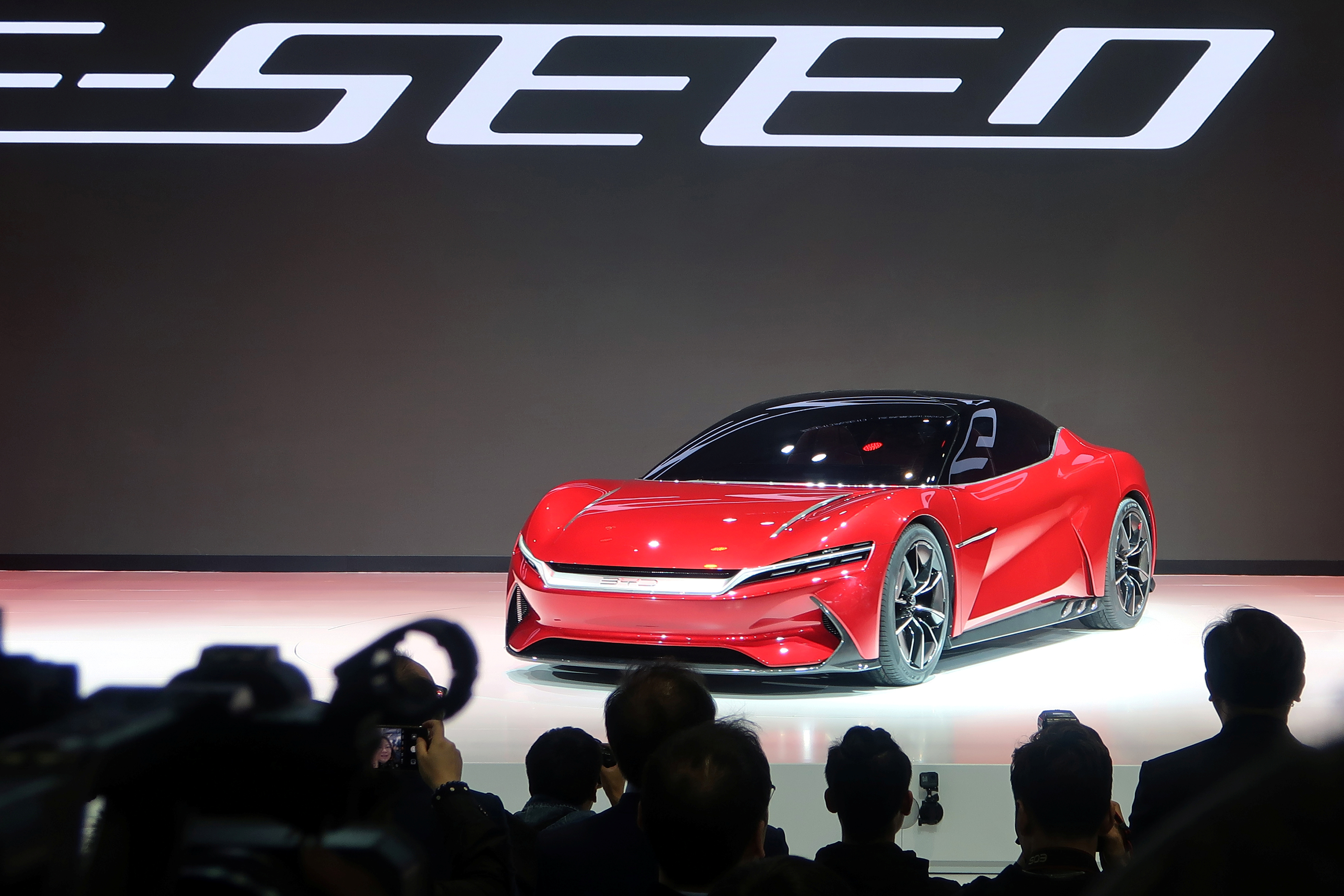 A BYD e-SEED GT concept EV is unveiled on the stage during the Shanghai autoshow, in Shanghai