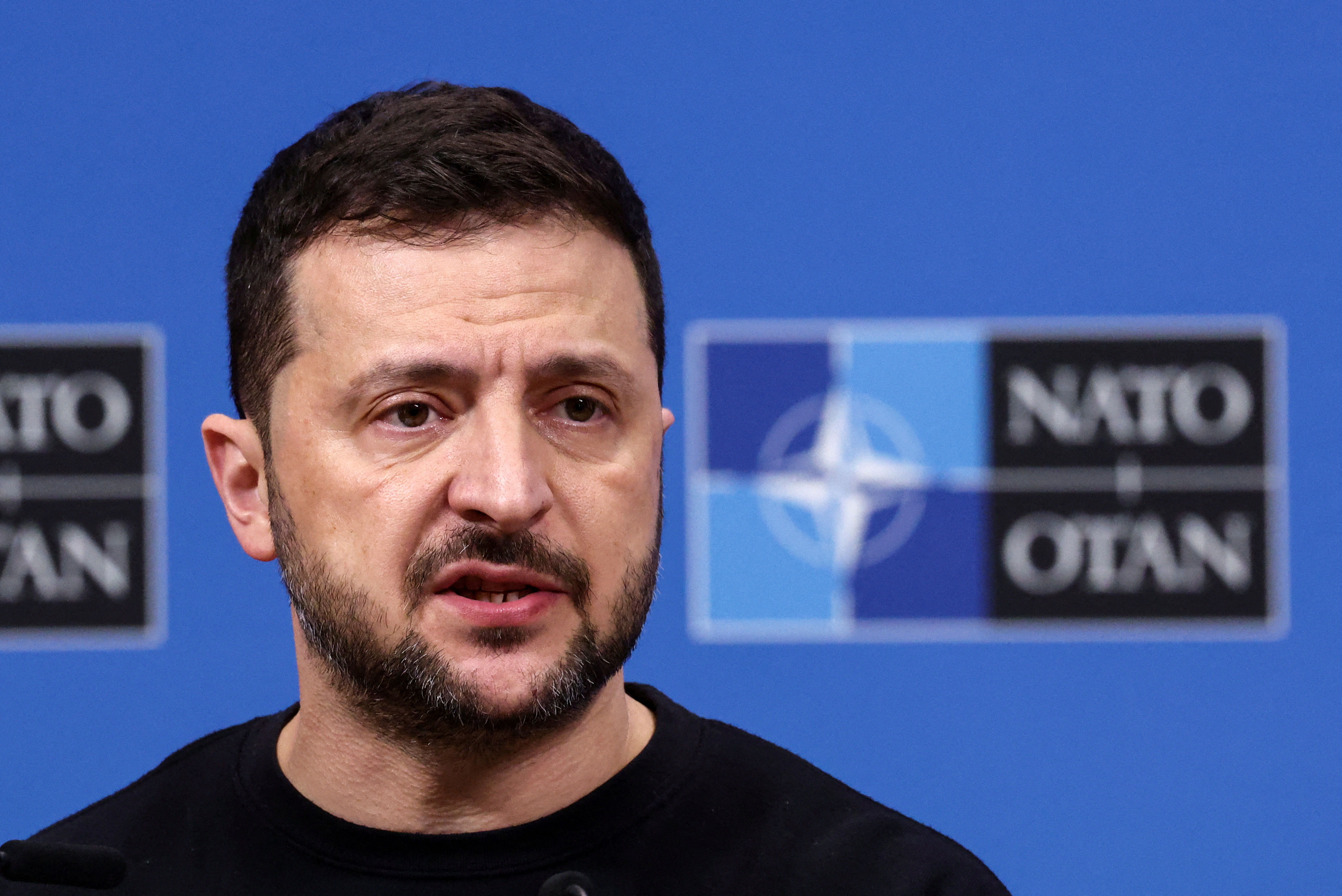 Ukraine's President Volodymyr Zelenskiy attends a press conference, in Brussels