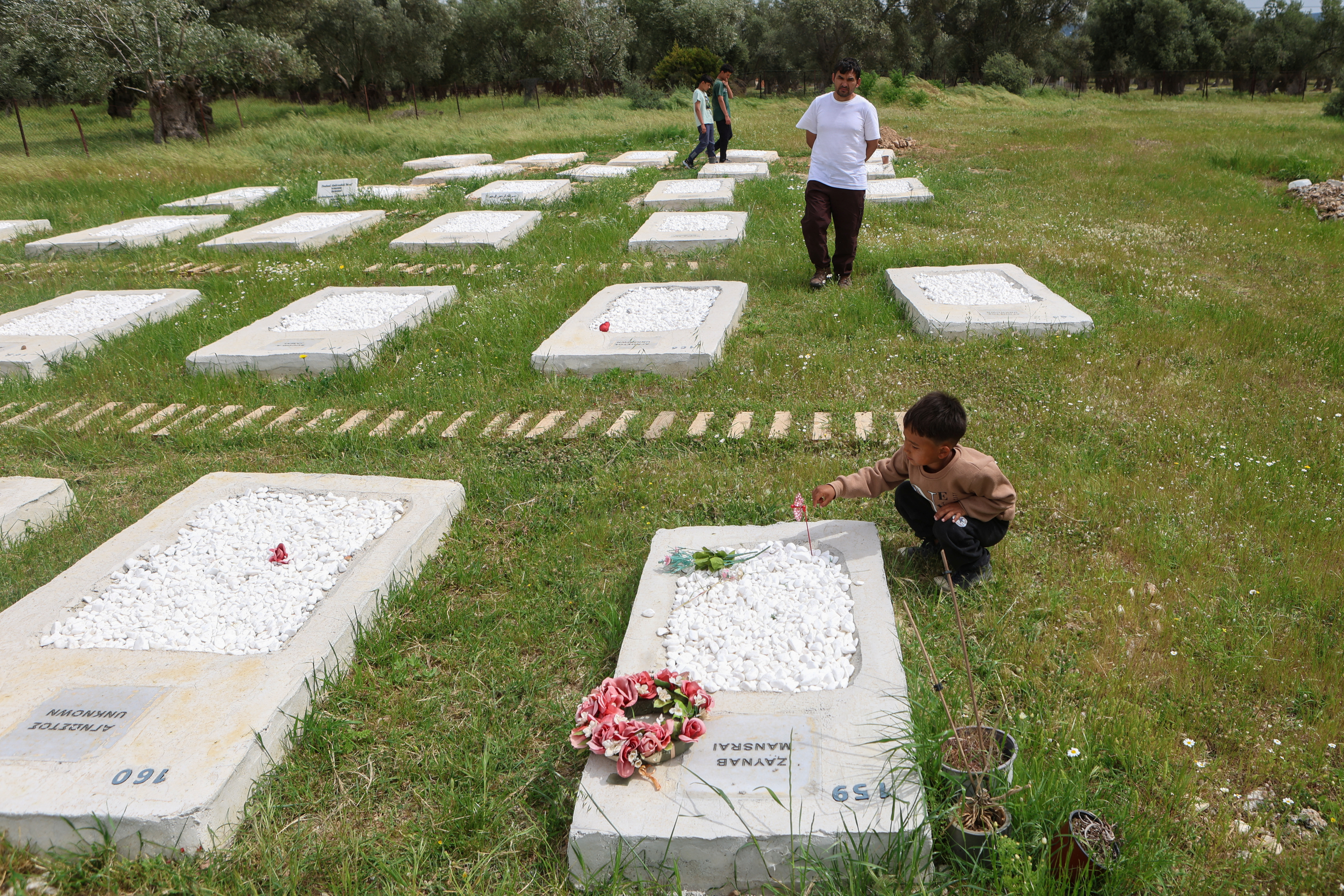 On a Greek island, volunteers remake burial site for refugees lost at sea |  Reuters