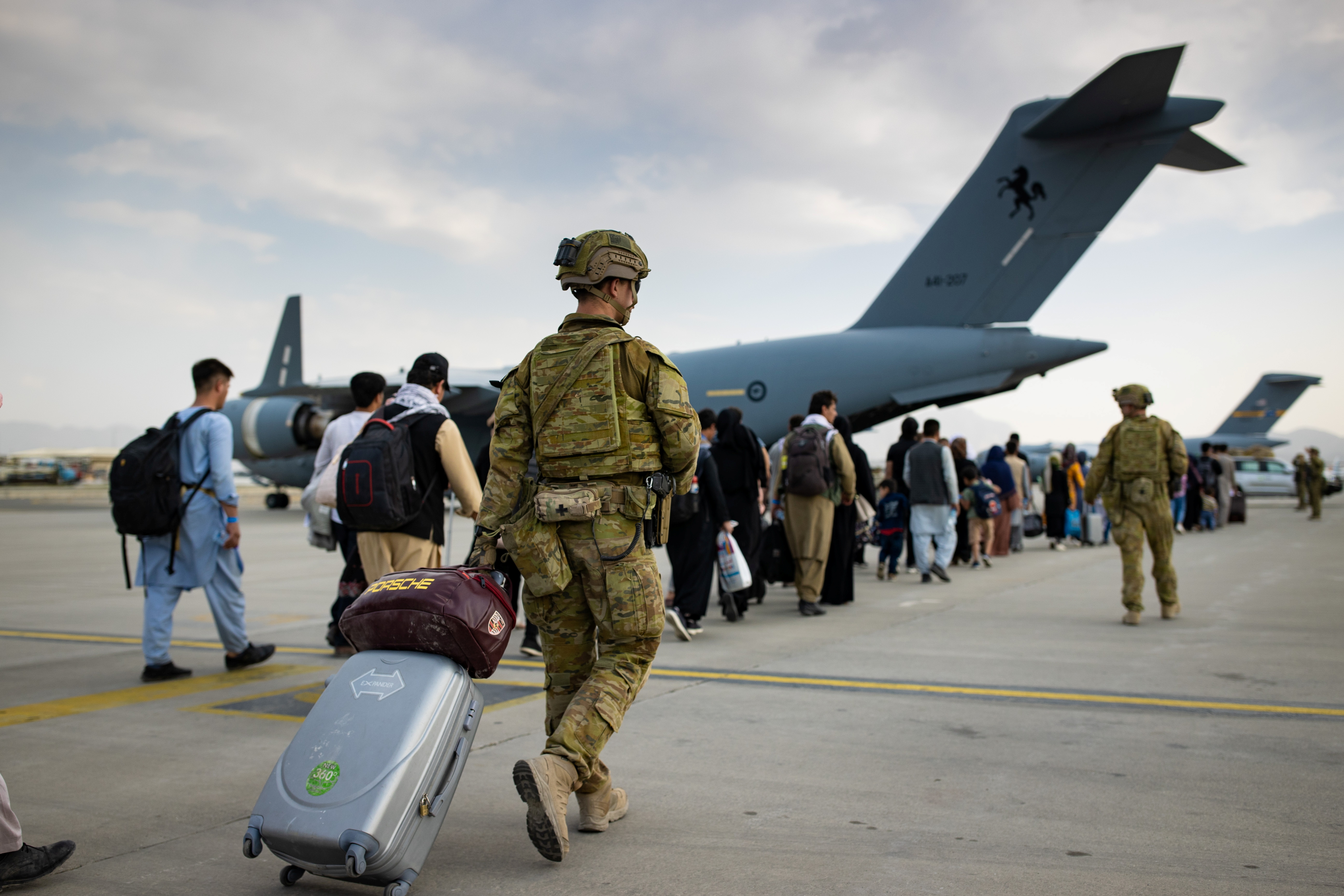 Australia Afghanistan evacuations after Kabul suicide attacks | Reuters