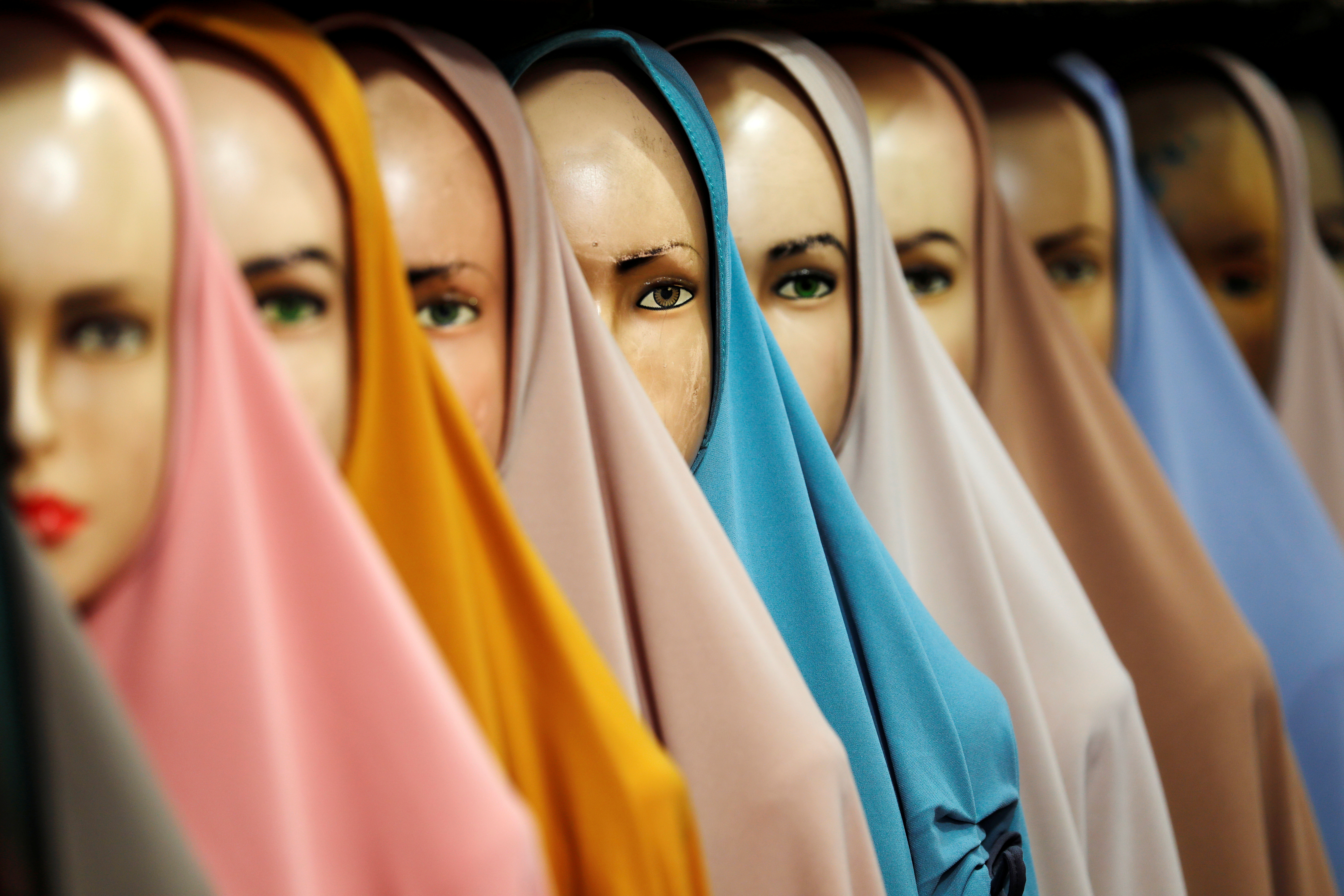 Hijabs for sale are pictured at a stall of Tanah Abang textile market in Jakarta