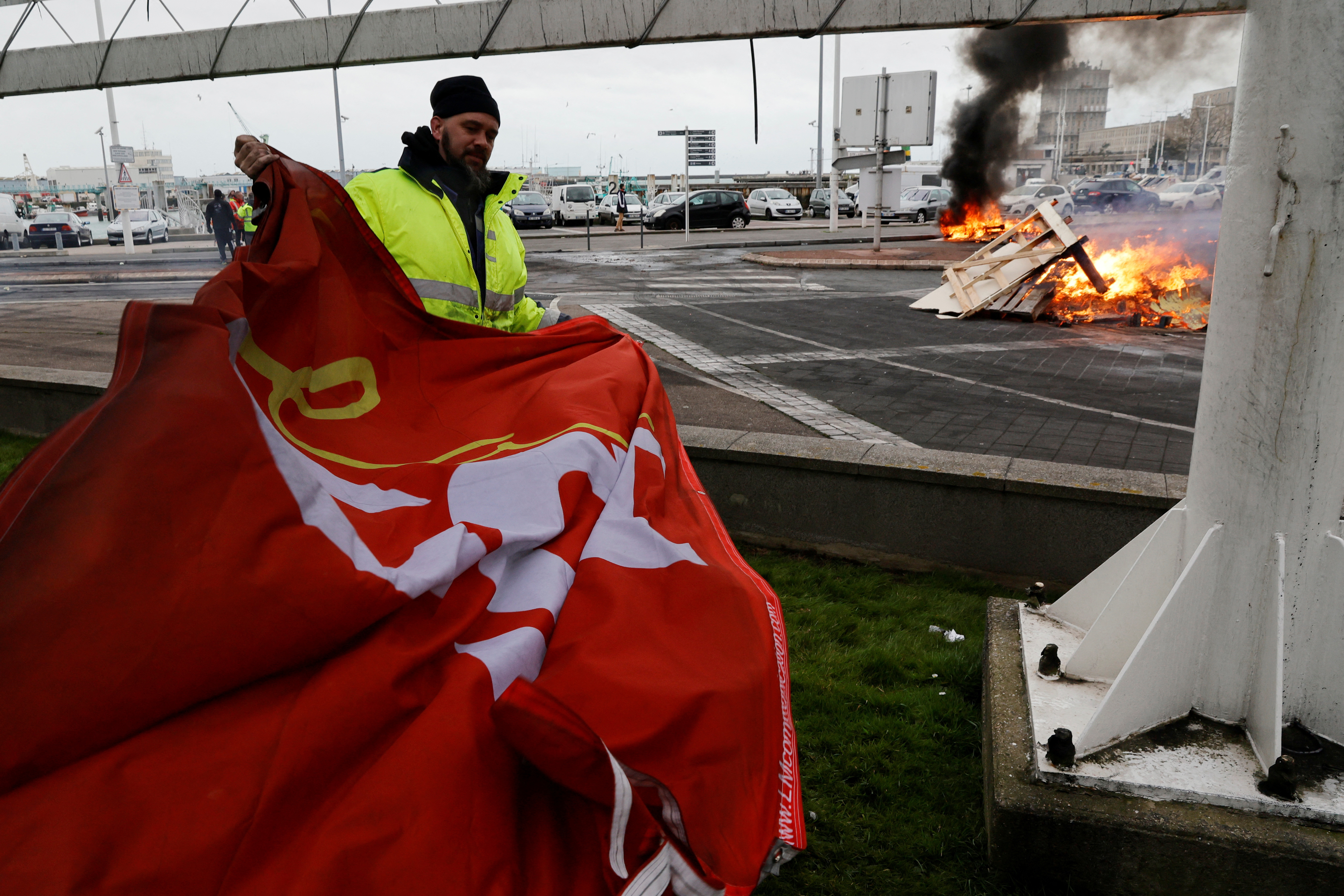 Port workers on strike protest pension reform in Le Havre