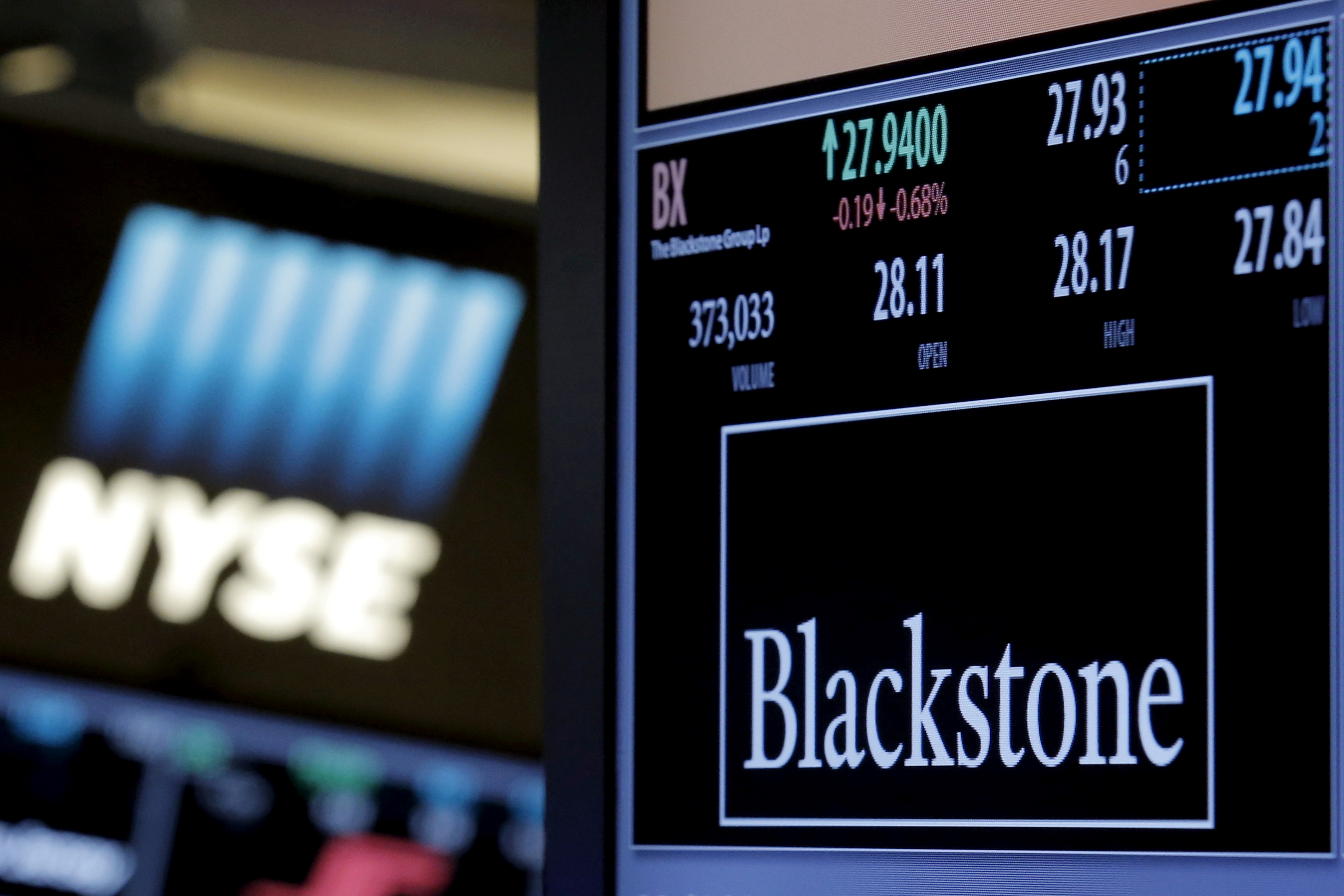 The ticker and trading information for Blackstone Group is displayed at the post where it is traded on the floor of the New York Stock Exchange (NYSE) April 4, 2016. REUTERS/Brendan McDermid/File Photo